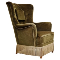 1960er Jahre, dänischer Vintage-Sessel mit hoher Rückenlehne aus grünem Samt, Originalzustand.