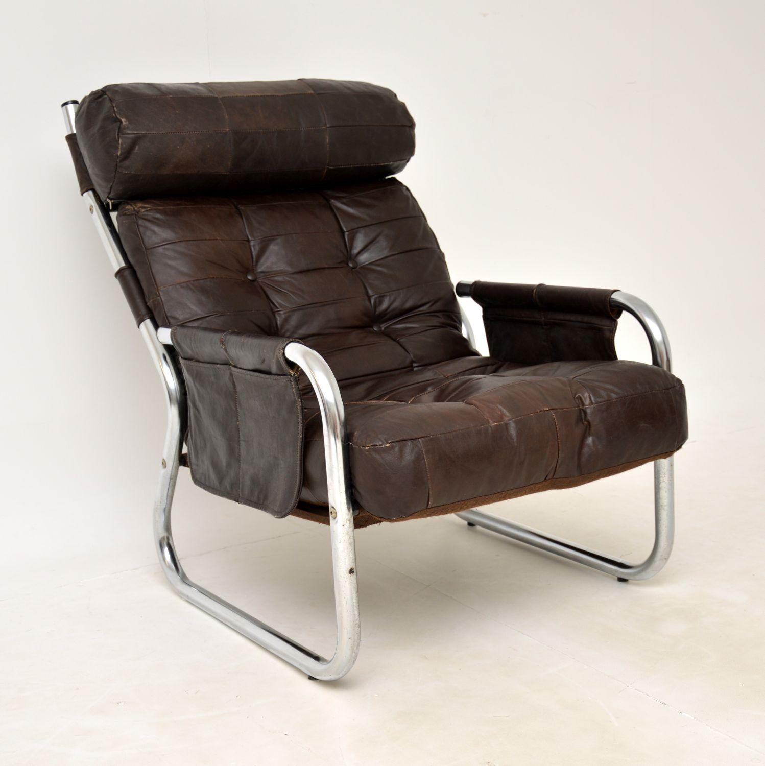 A stylish and extremely comfortable vintage Danish armchair in leather and chrome. This was recently imported from Denmark, it dates from the 1960-1970’s.

The quality is excellent, with a nicely shaped thick tubular steel frame and patchwork