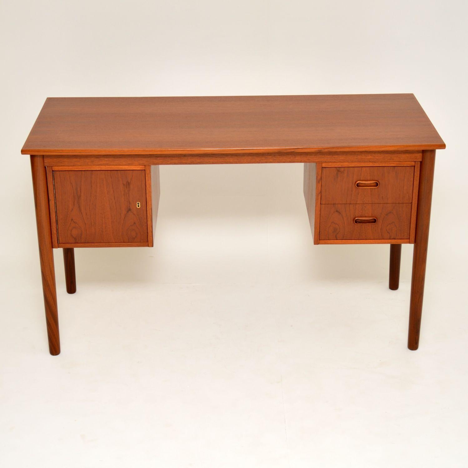 A beautifully made and very stylish vintage desk in Teak, this was made in Denmark and it dates from the 1960s. The proportions on this are lovely, it is also nicely finished on the back if you wanted to use it as a free standing piece. This comes