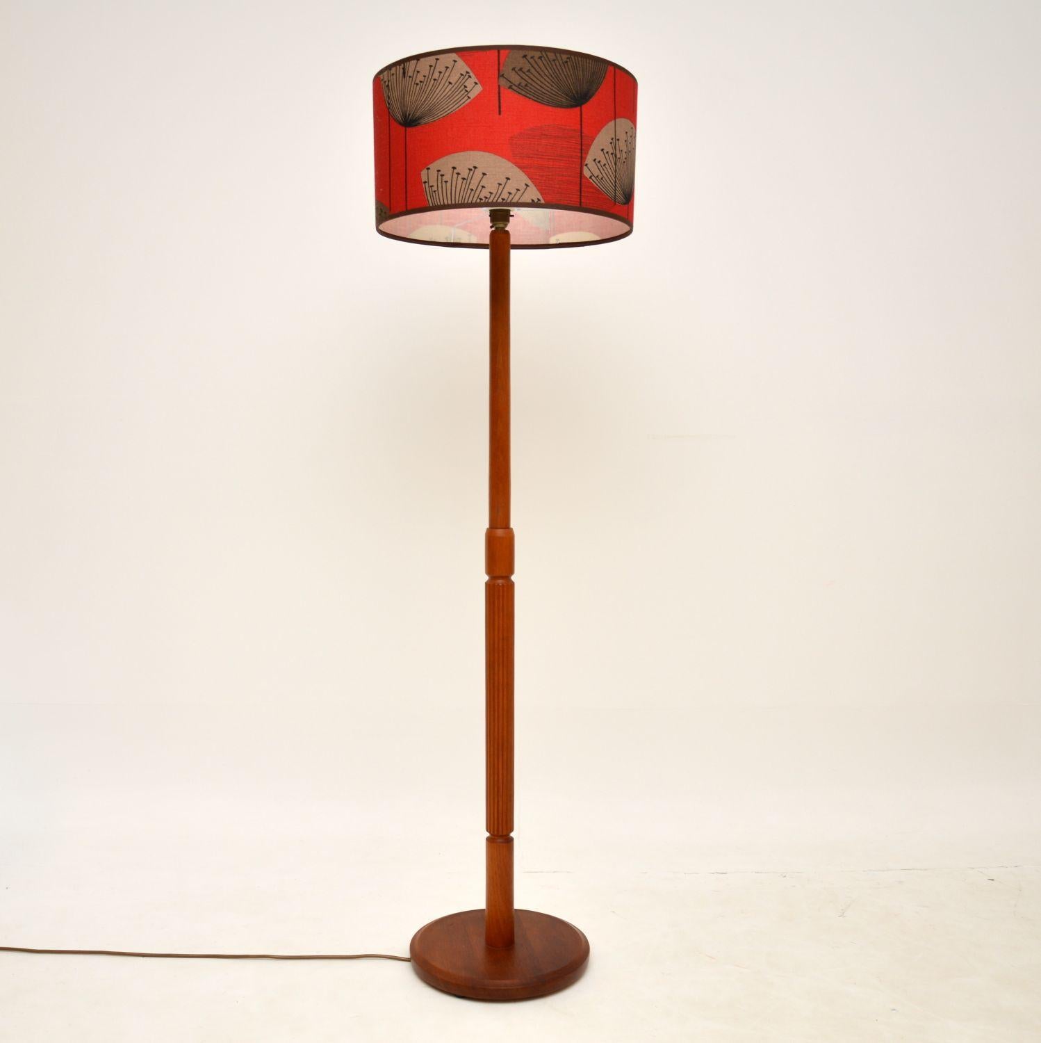 A stylish and very well made vintage lamp in solid teak. This was made in Denmark and dates from around the 1960’s.

It is of lovely quality, with a lovely grooved design at the lower half of the base. It is slightly lower than most standard floor