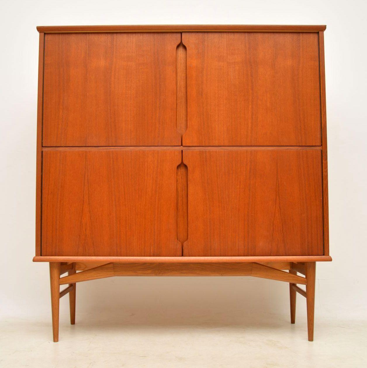 A stunning and extremely well made 1960s vintage cabinet in teak, this was made in Denmark, this model is called ‘Fredericia’. It is in superb condition for its age, it is clean, sturdy and sound. There has been a tiny repair to the veneer on the