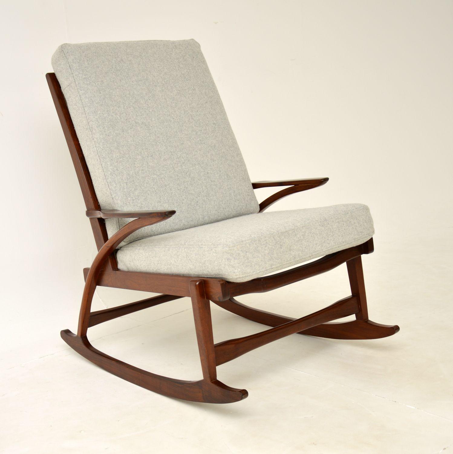 A beautiful vintage Danish rocking chair in solid walnut. This was made in Denmark, it dates from the 1960’s.

The quality is superb, this has a stunning design and is very comfortable. The frame has a gorgeous colour and very striking grain
