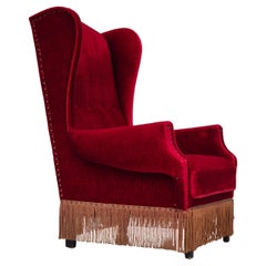 Retro 1960s, Danish wingback armchair, original, furniture velour, oak wood legs.