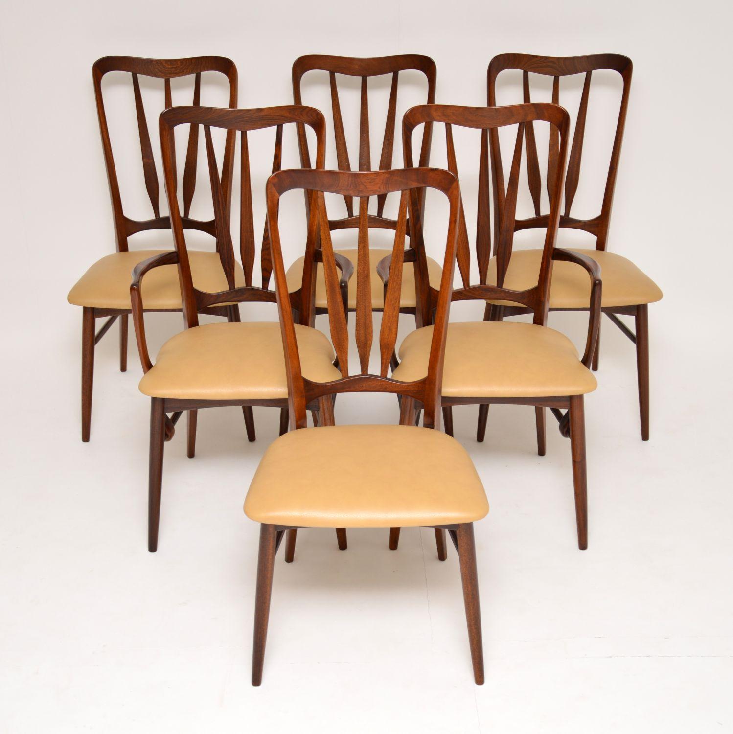 An absolutely stunning and extremely well made set of vintage Danish dining chairs in afromosia wood, these were designed by Nils Kofoed, they were made in Denmark in the 1960s. This model is called the “Ingrid” chair, and they have a beautiful