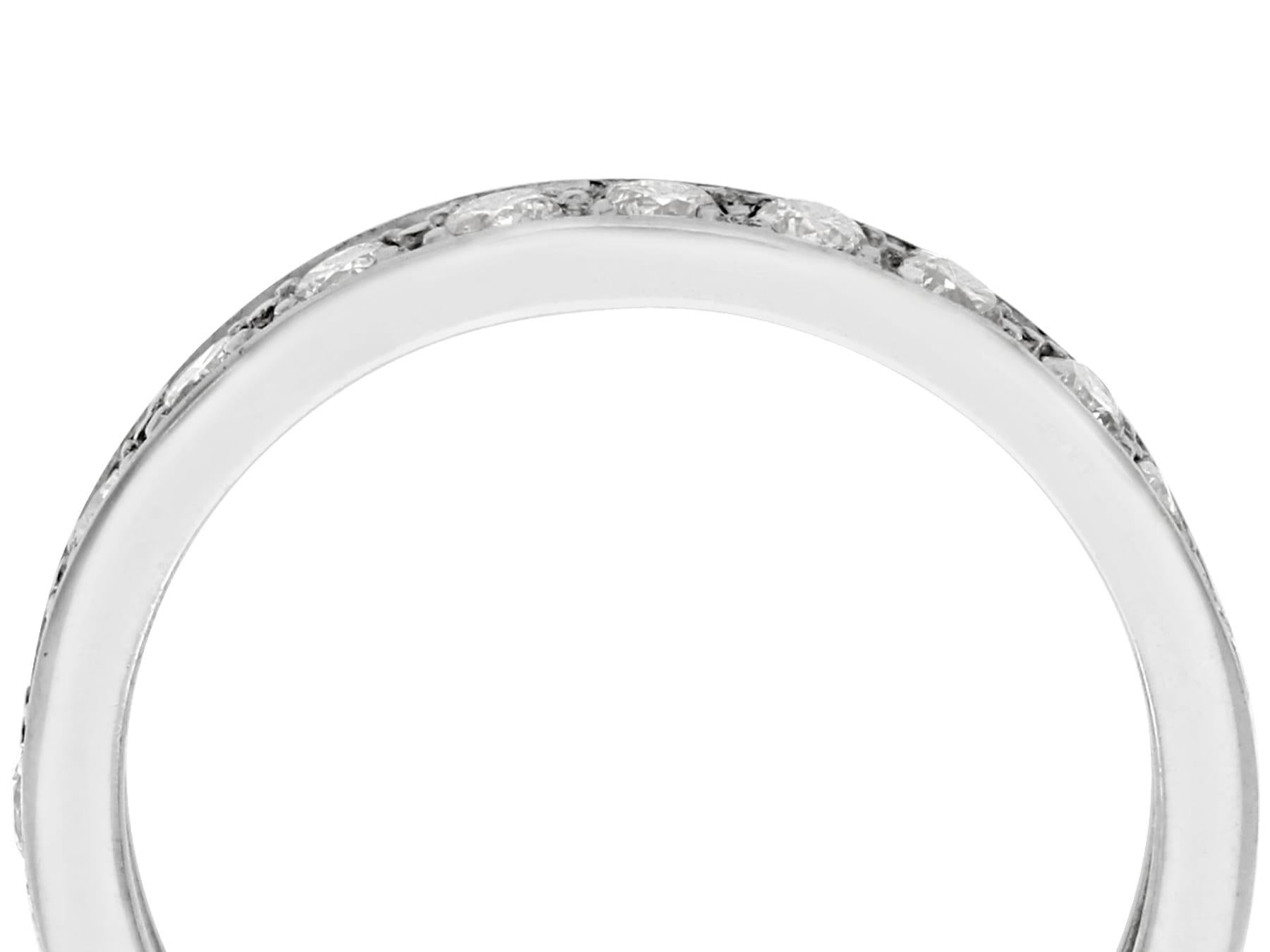 A fine and impressive vintage 1960s 0.68 carat diamond and 18 karat white gold full eternity ring; part of our diverse diamond jewelry collections.

This fine and impressive vintage eternity ring has been crafted in 18k white gold.

The ring is