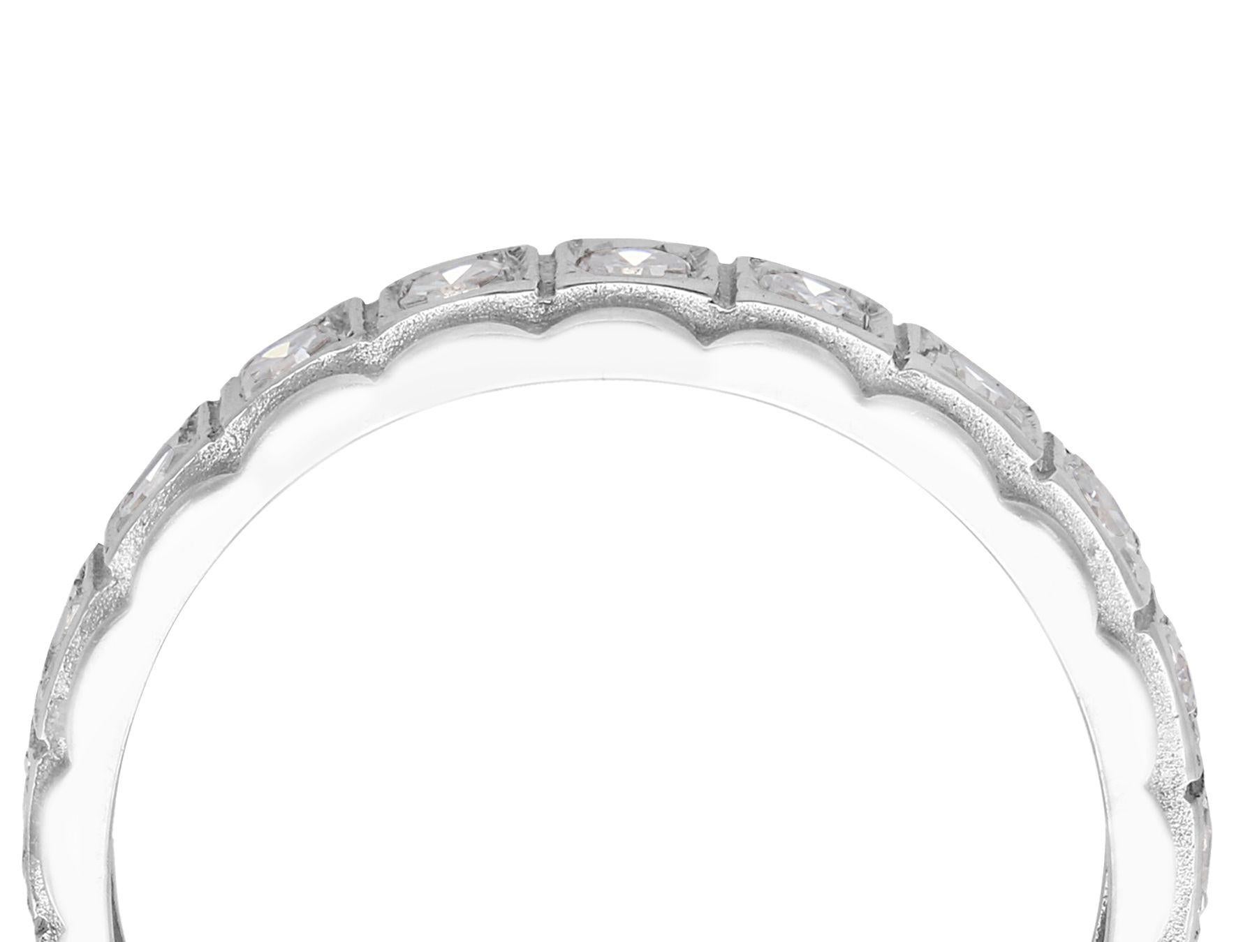 A fine and impressive vintage 0.75 carat diamond and 18 karat white gold full eternity ring; part of our vintage jewelry and estate jewelry collections.

This fine and impressive vintage eternity ring has been crafted in 18k white gold.

The