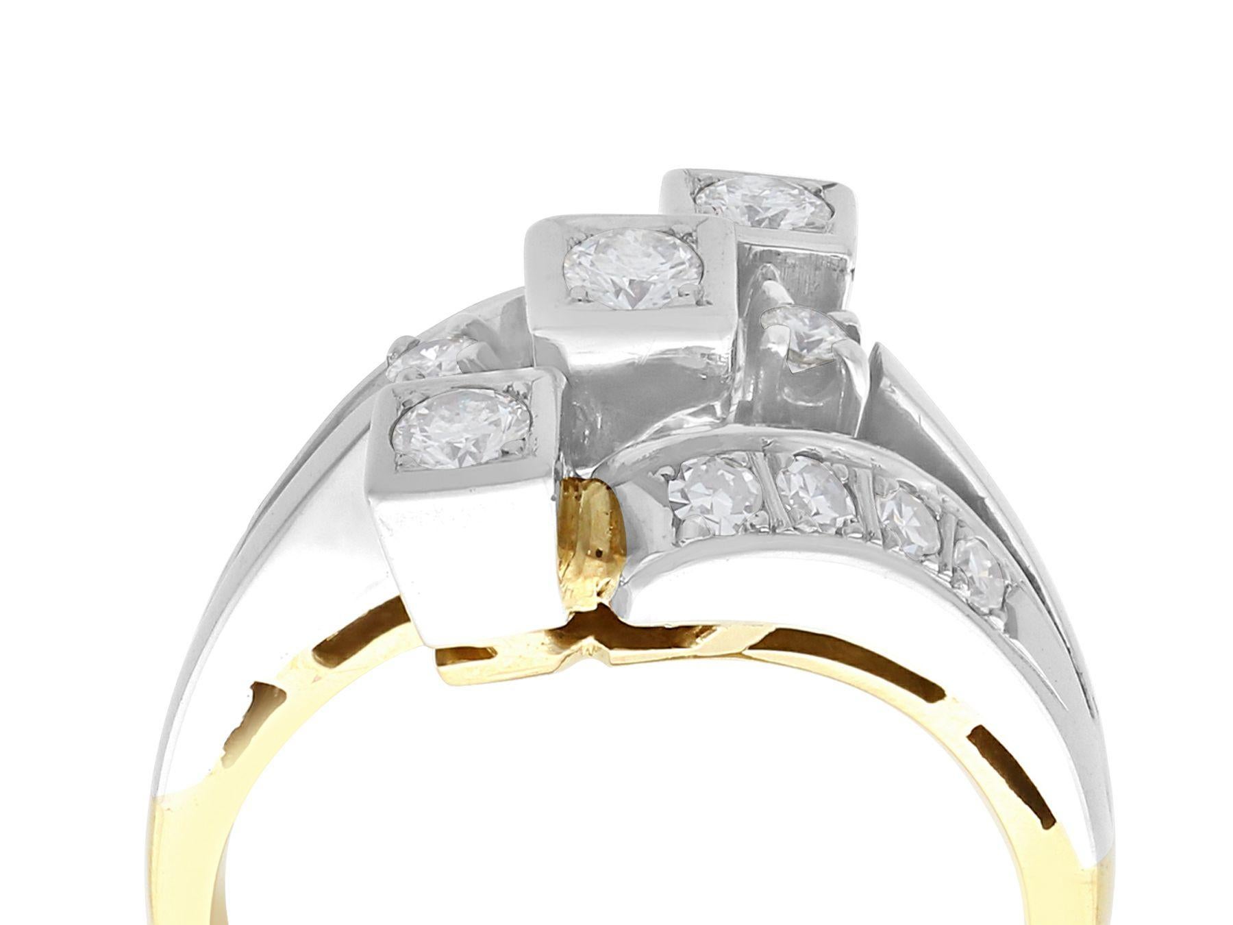 This fine and impressive vintage diamond cocktail ring has been crafted in 14k yellow gold with a 14k white gold setting.

The pierced decorated 14k white gold twist design is ornamented with three transitional modern brilliant round cut diamonds,