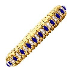 1960s Diamond Blue Enamel Flexible 18 Karat Yellow Gold Estate Bracelet