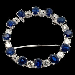 1960's Diamond & Blue Sapphire Platinum Circle Pin Brooch