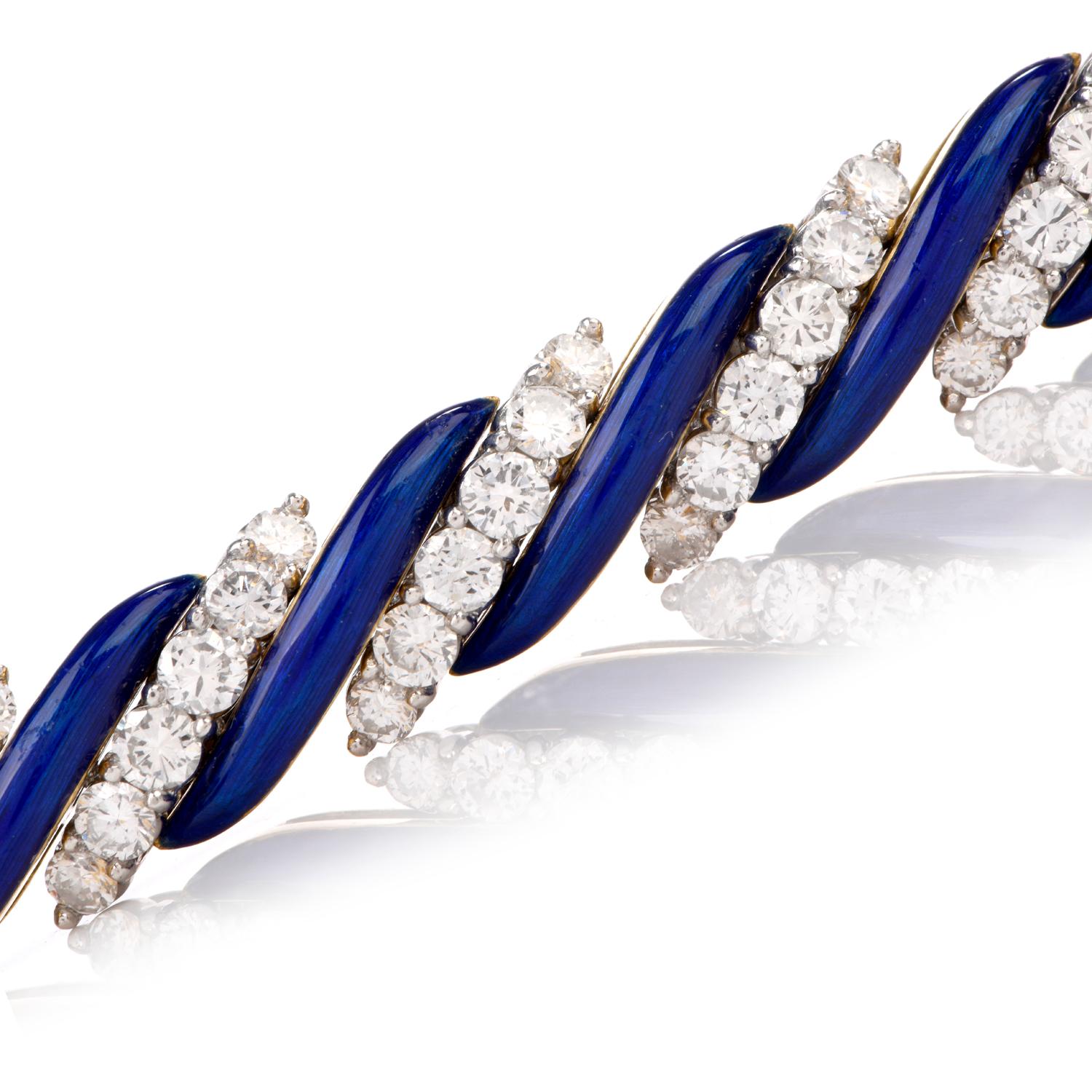 This nicely made 1960's Diamond and Blue Enamel bracelet was inspired in a Candy Stipe motif and crafted in 18 Karat gold.
Very Fine made alternating diagonal stripes of Diamond and Blue Enamel adorn this piece. 86 fine round-cut diamonds weighing