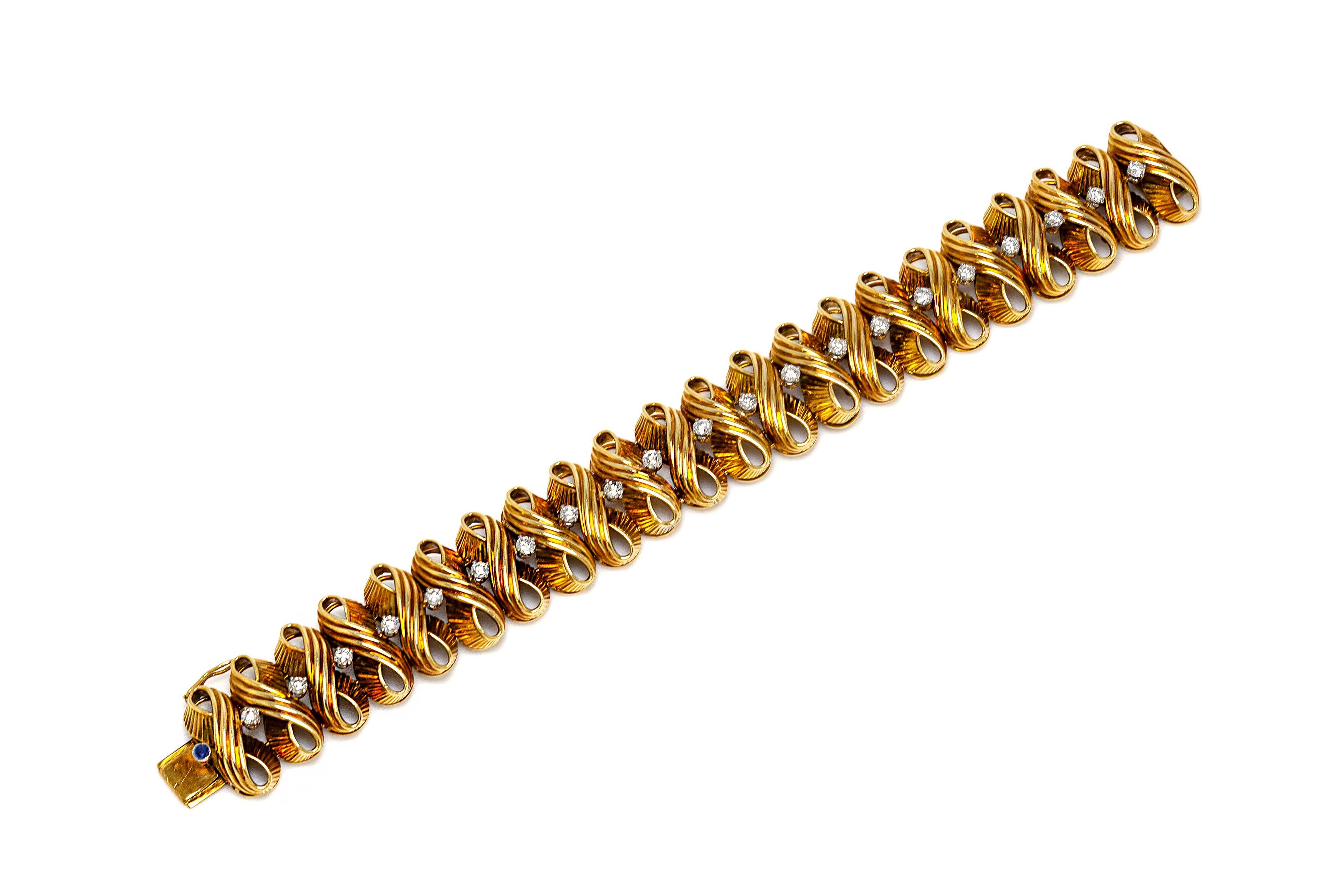 Bracelet finely crafted in 18k yellow gold with diamond weighing a total of 2.50 carat. Length of the bracelet is 20 cm/8 inch. Circa 1960's.