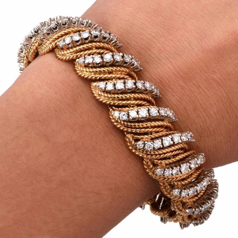 This  bracelet of opulent and classically distinct aesthetic is crafted in solid 18K immaculately braided  yellow gold, weighs 72.2 grams and measures 7.2