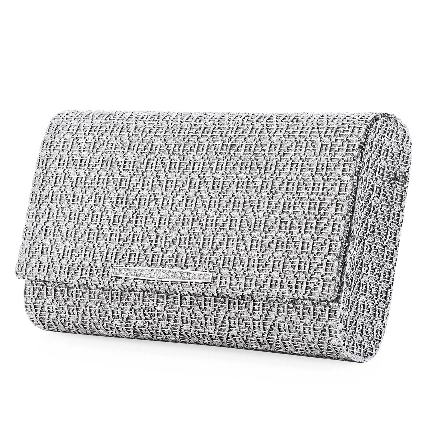 This exquisite Vintage Clutch Purse from the 1960s was designed with a soft textured woven style, crafted in solid with 18K White Gold.

Topped with (15) round cut, pave set, genuine diamonds, weighing approximately 0.35carats (G-H color and