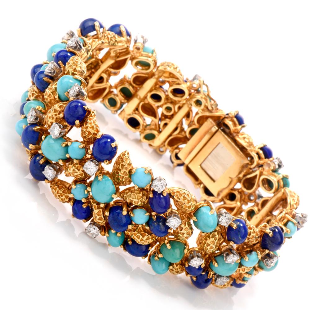 Adorn your arm and complete the look with this 

Statement, vintage, Circa 1970 wide bracelet.  

Crafted in 18K yellow gold, the intricate pattern has woven throughout 

both round and oval cabochon cut Lapis Lazuli and Persian Turquoise. Amidst