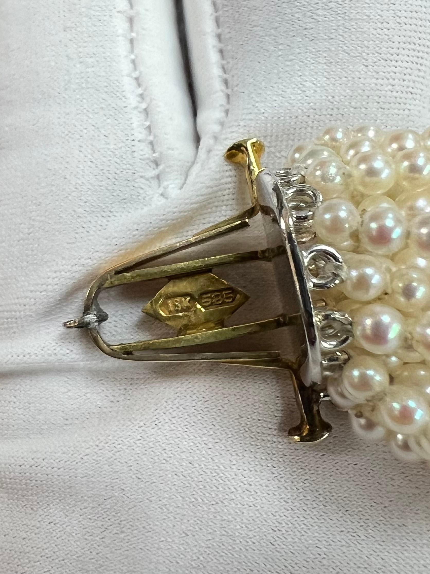 1960s Diamond Leopard Head Pearl And Gold Torsade Bracelet 11