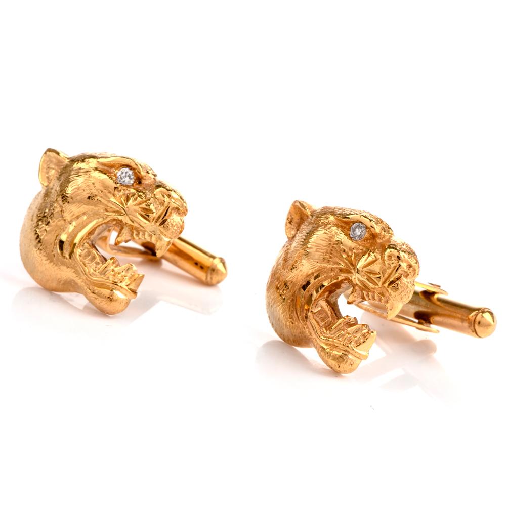 These collectible roaring panther cufflinks are crafted in 18-karat yellow gold, weighing 13 grams and measuring 19mm x 11mm. Simulating a pair of intricately designed panther heads, prong-set with a two round-cut diamonds as eyes, collectively
