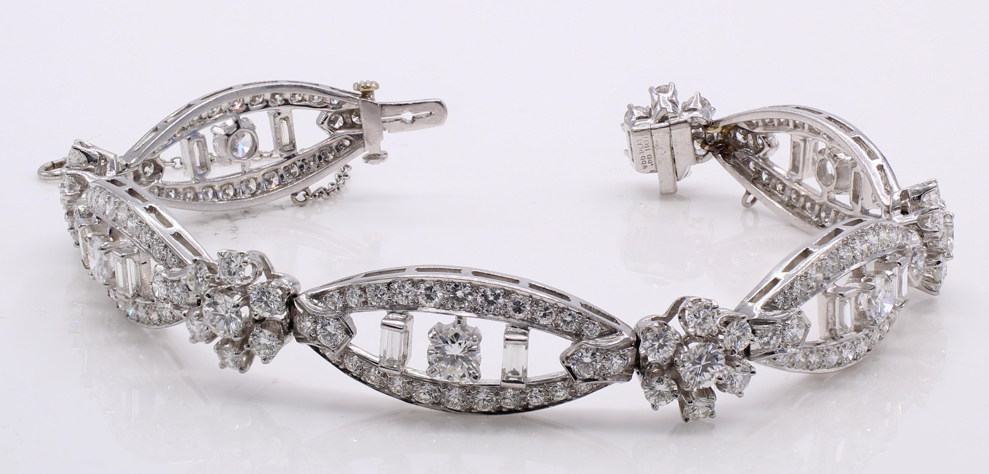 Wonderfully handcrafted 1960s platinum diamond cocktail bracelet. 5 flexible oval sections set with round and baguette cut diamonds and spaced by 5 rosette shaped sections set with round brilliant cut diamonds give this bracelet its chic and elegant