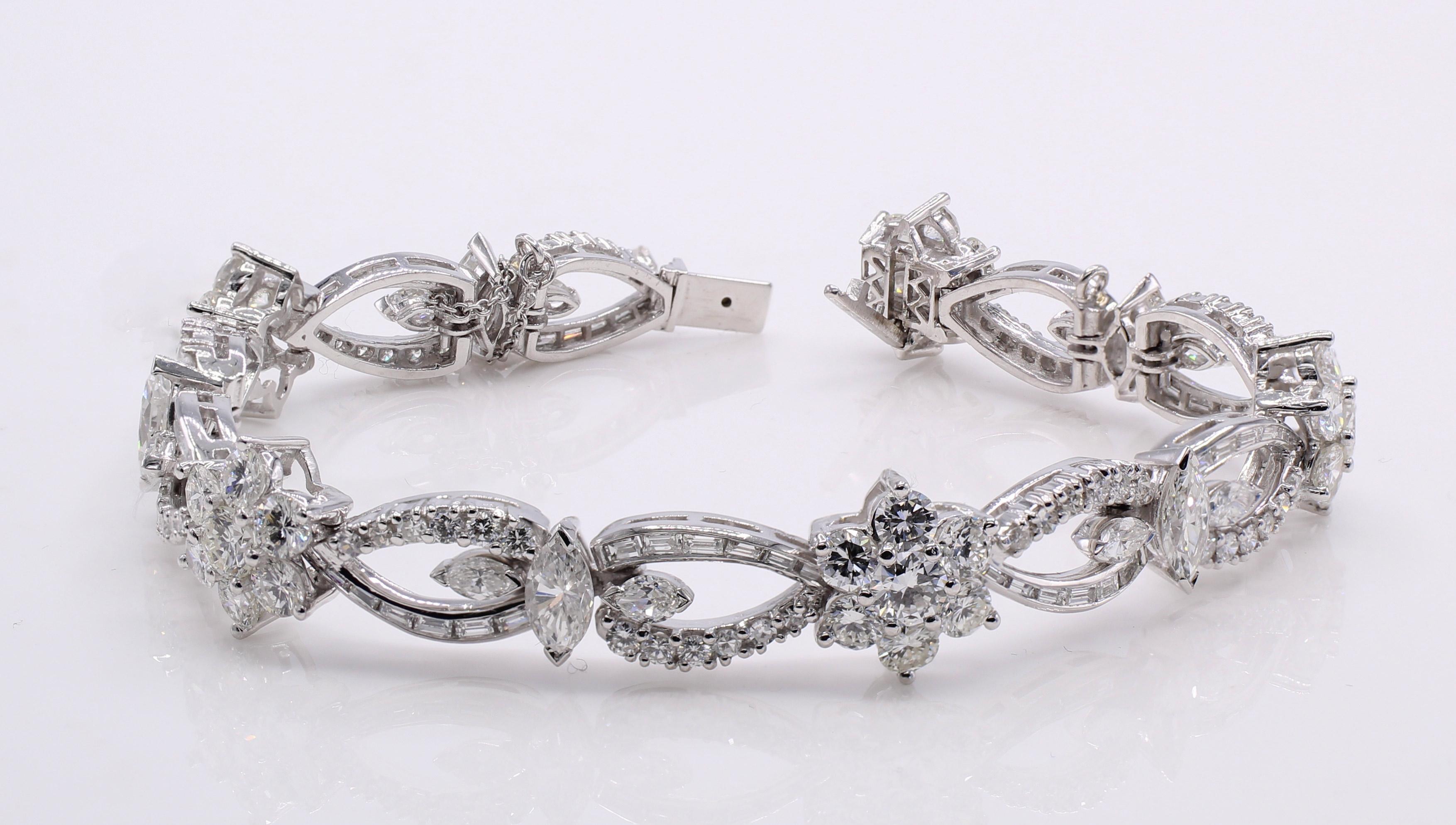 Beautifully designed and masterfully handcrafted, this 1960s platinum bracelet is decoratively set with round, marquis and baguette cut diamonds. The flexible sections sparkle and shine with the high quality perfectly matched diamonds with and