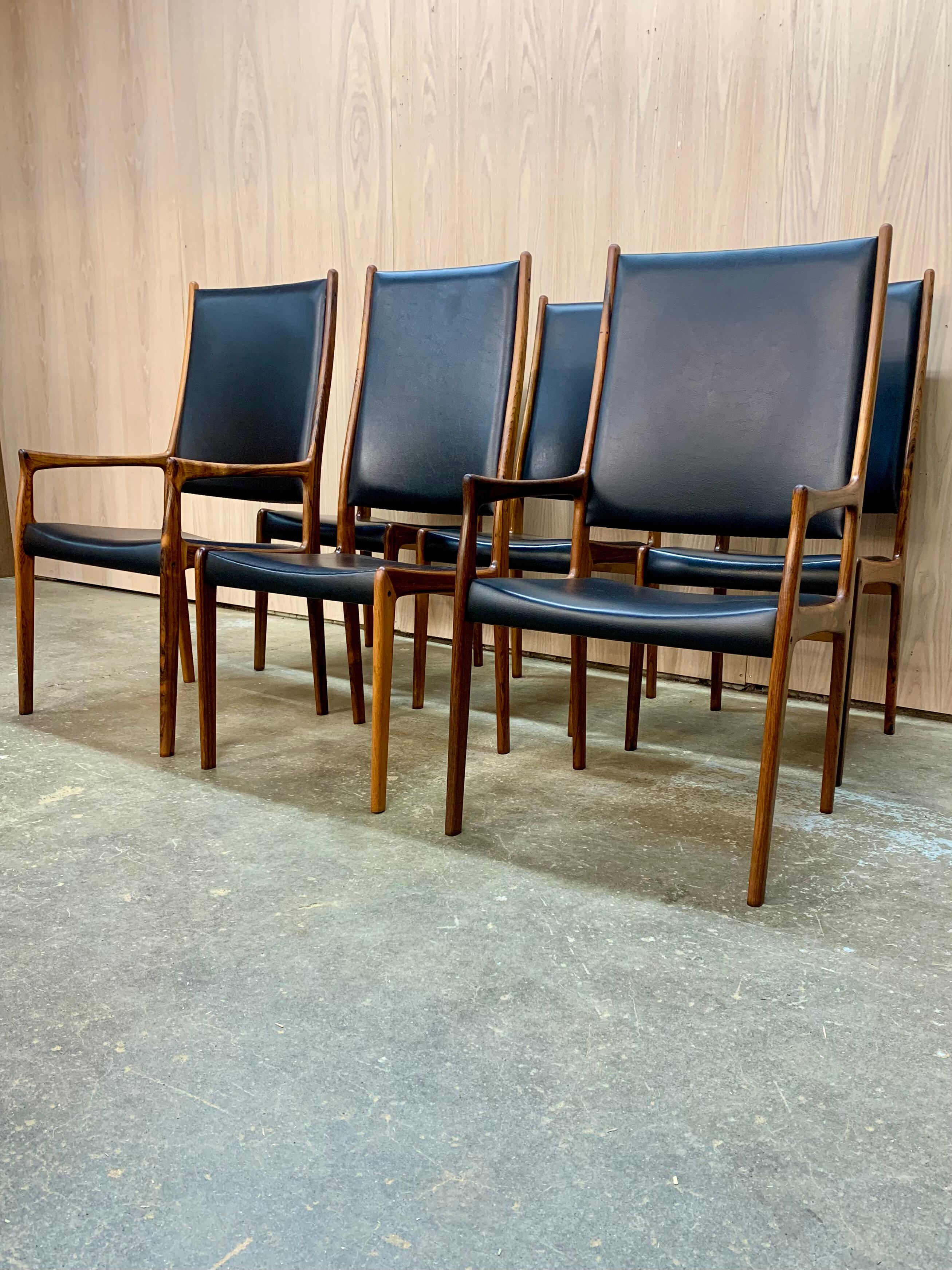 Just in: a breathtaking set of Danish dining chairs designed by Johannes Andersen for Mogens Kold in the 1960s. Crafted from richly figured, solid old-growth Brazilian rosewood, these chairs are a true testament to the timeless appeal of the Danish