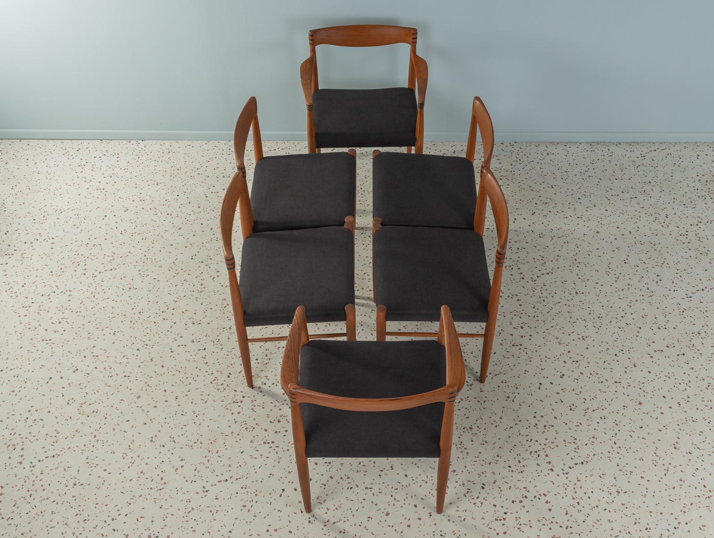 Classic chairs from the 1960s by H.W. Klein for Bramin. Solid teak frame with mortise & tenon backrest and mortise & tenon armrests. The chairs have been reupholstered and covered with a high-quality fabric in black. The offer includes 6 chairs.