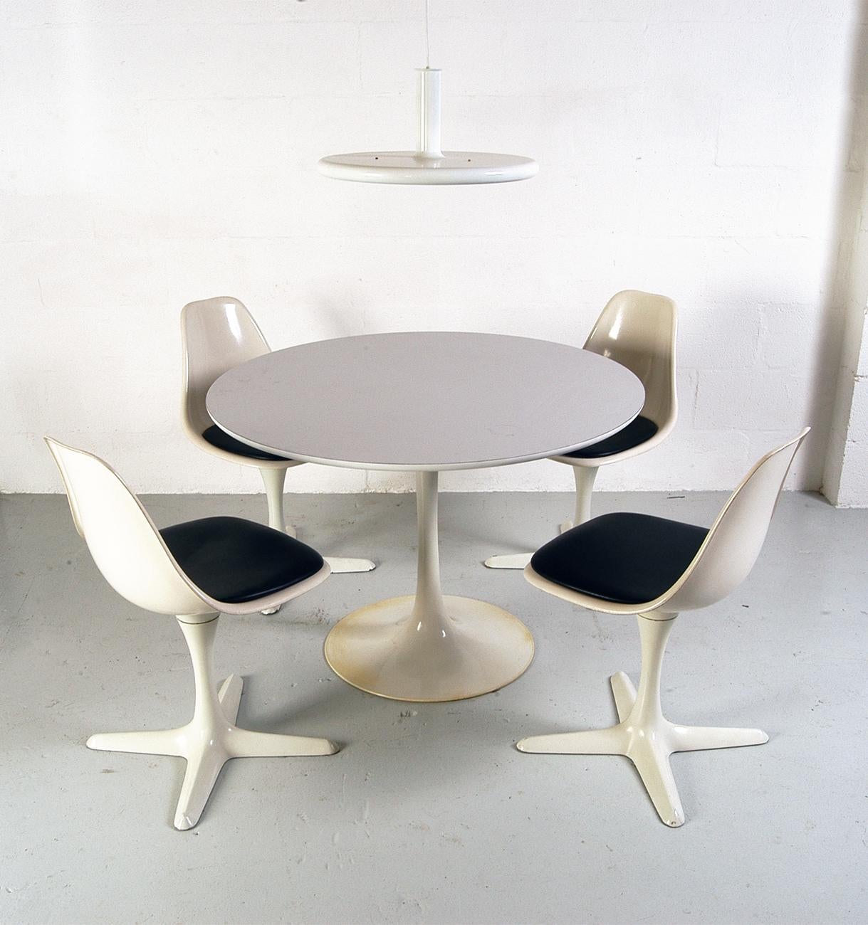 1960s Dining room suite by Maurice Burke for Arkana, Bath, England.
This terrific ‘Space Age’ dining suite consists of the table and four matching chairs and would have been the height of fashion when new in the early 1960s. All four chairs rotate