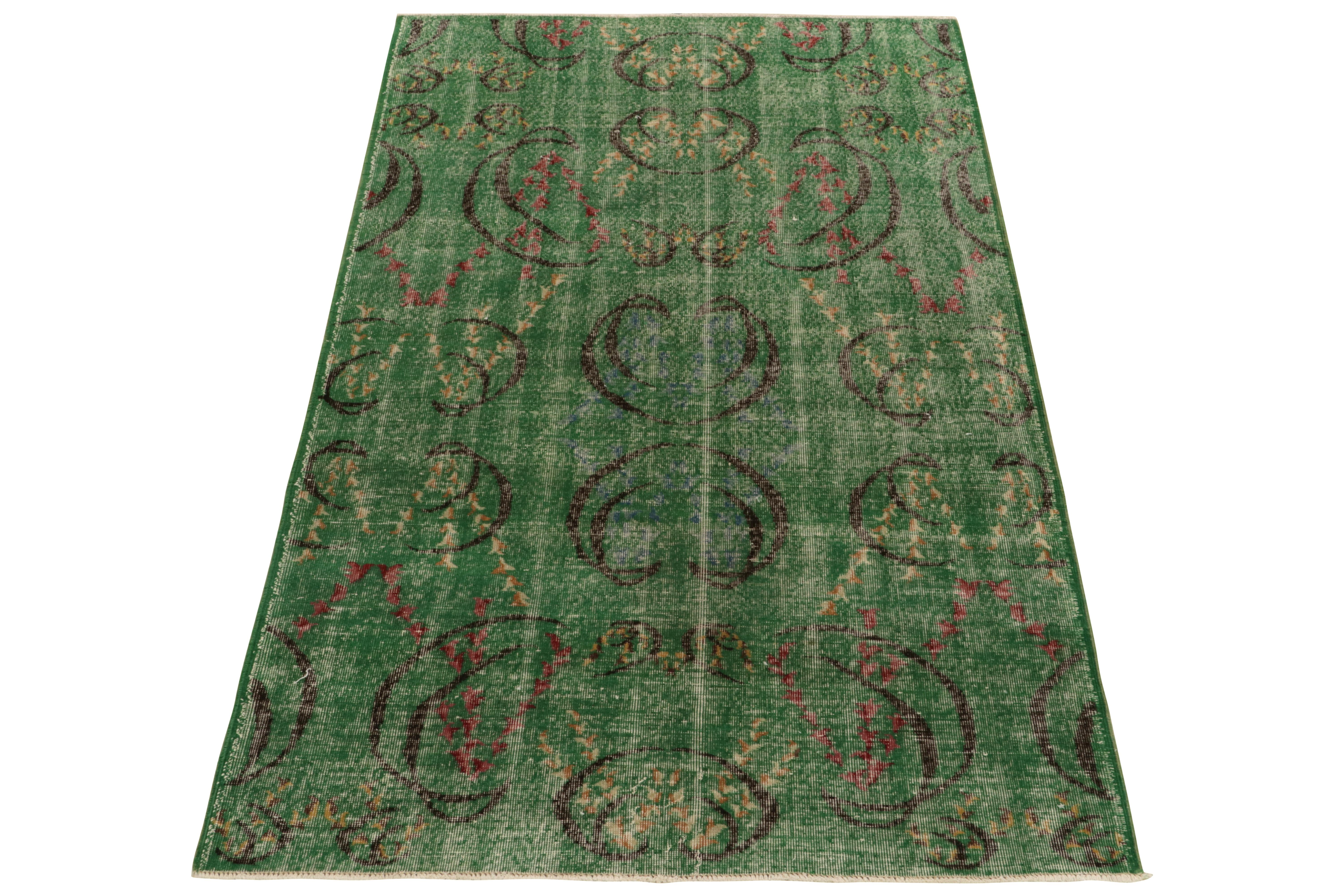 A vintage 5x8 distressed Art Deco rug, hand-knotted in wool circa 1960-1970. Joining Rug & Kilim’s Mid-Century Pasha Collection, commemorating a bold Turkish multidisciplinary artist of the period known for these low-sheared pile