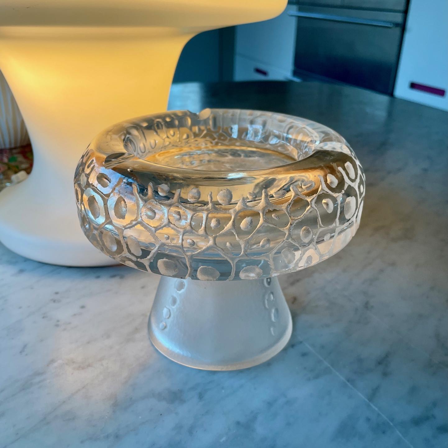 Wonderful footed heavy art glass footed cigar / cigarette ashtray / dish.  No chips, No cracks. Unsigned, Estimated Age and Origin.

Dia 6 5/8 x H 5 1/4 in.
Wt. 5 lbs. 2 oz.


