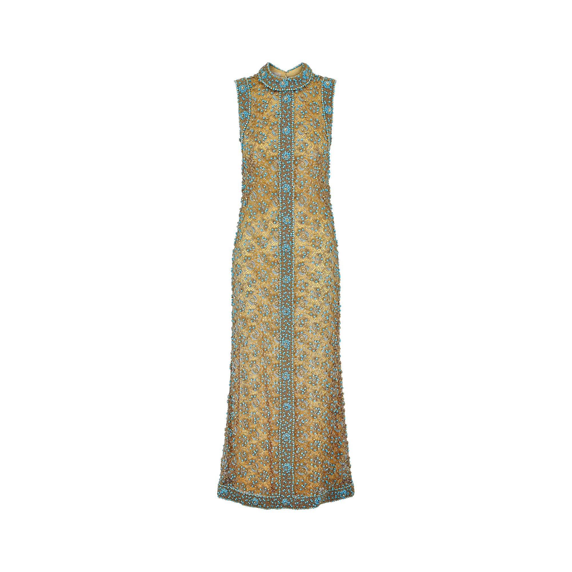 This exquisite 1960s Doreen Lok gold and turquoise dress is a perfect choice for a very special event. An absolute show-stopper and this level of intricate detail is rarely seen in such flawless vintage condition.  Full length, this gown features a