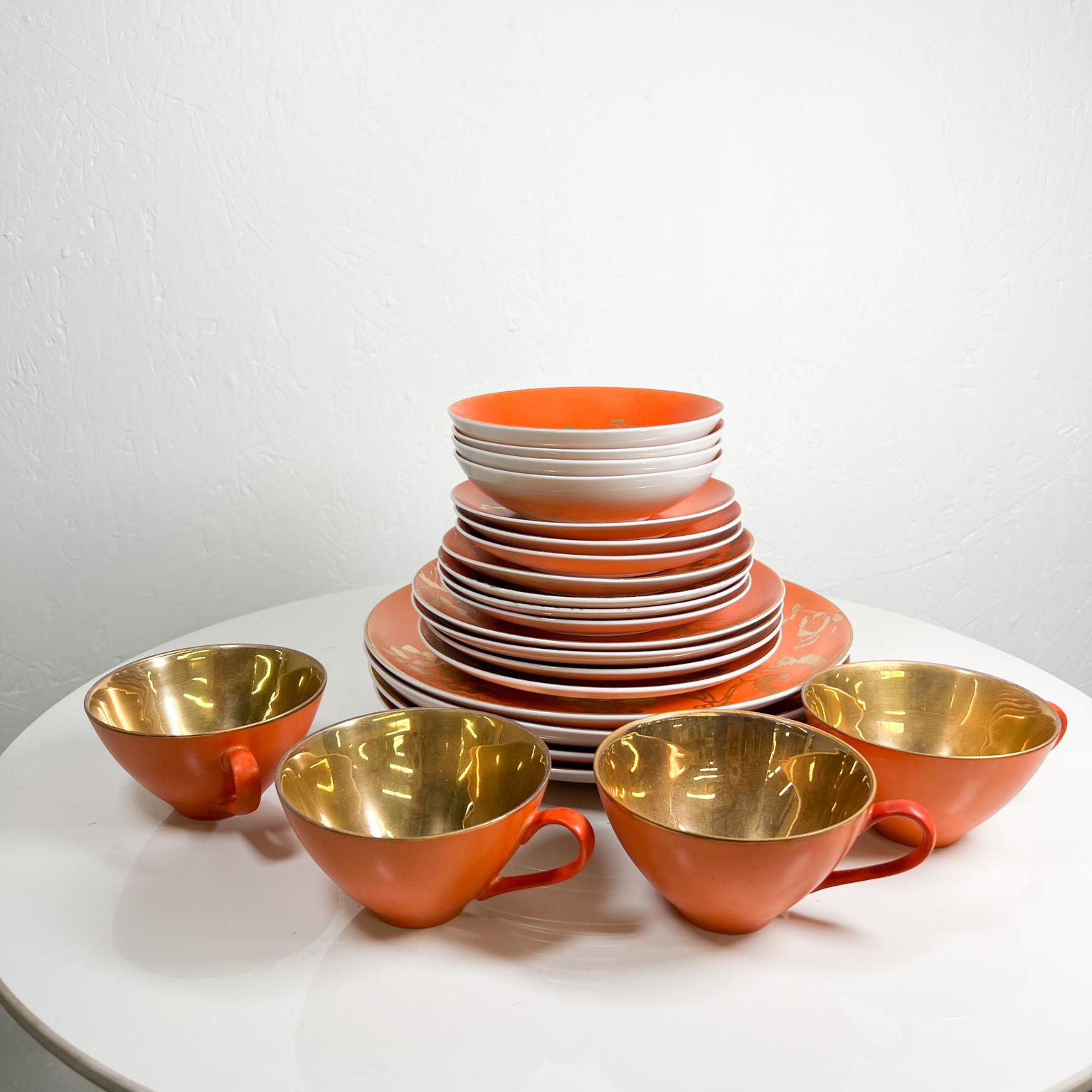 1960s Dorothy C. Thorpe California Persimmon pattern Orange & Gold Dinnerware Set
Service for four
Butterfly and floral design
Fine Bone China Ceramic
Maker stamped.
Set Includes 24 pieces (4) dinner plate 10.25 (4) Salad plate 7.75 (4) Bread plate