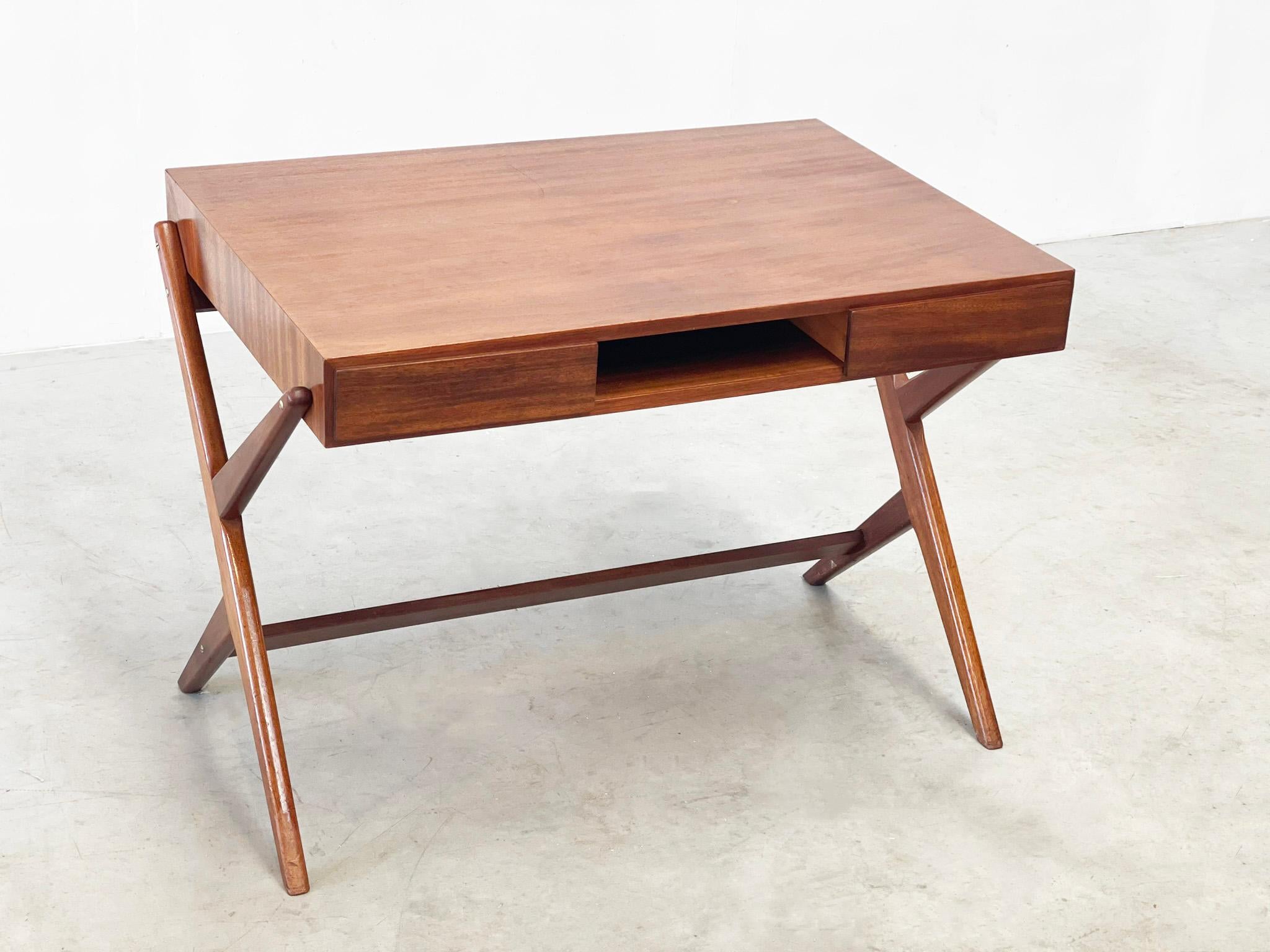 1960's double sided wooden Italian desk with a beautiful shape 1