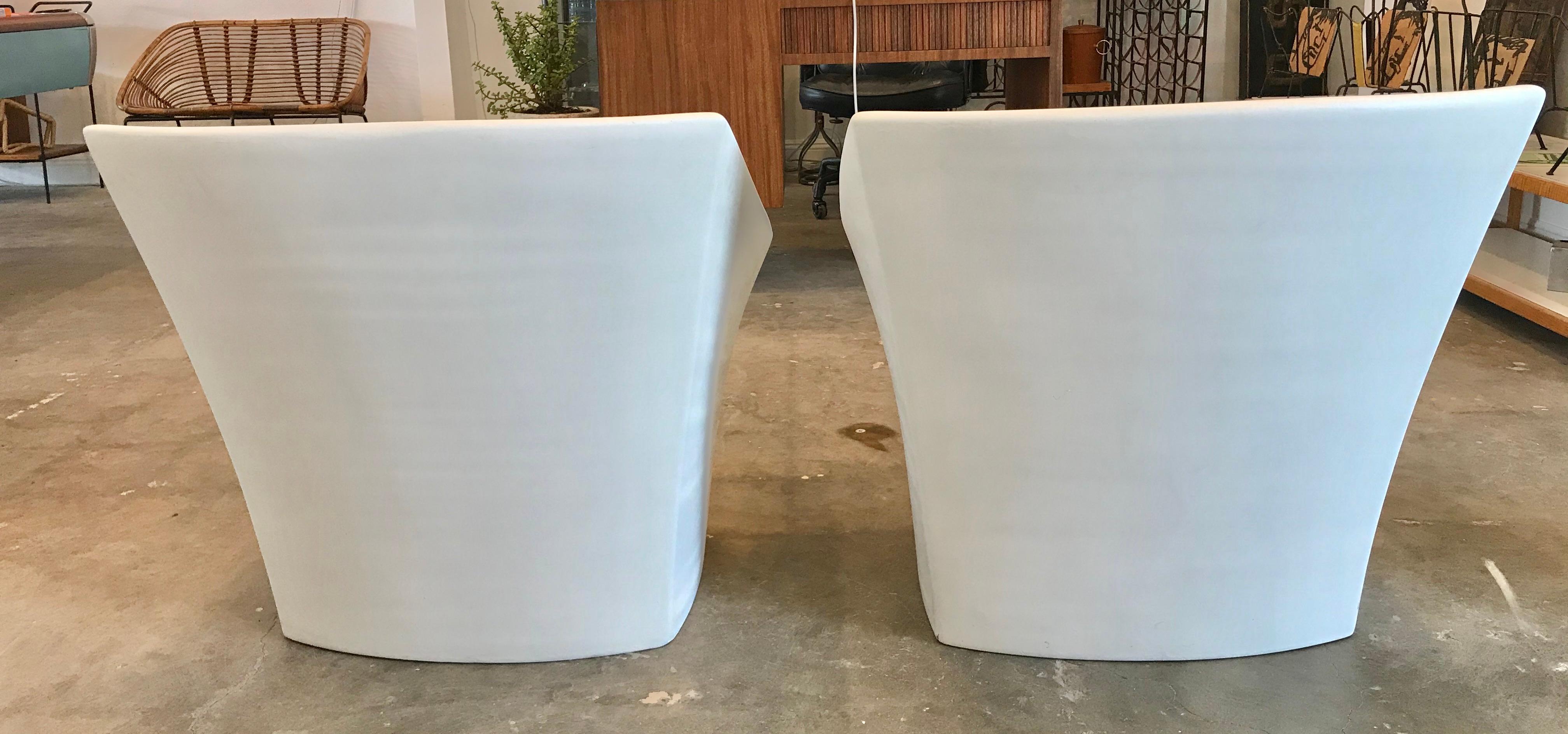 Fantastic pair of sculptural fiberglass outdoor chairs by Douglas Deeds for Architectural Fiberglass. Great scale and lines with large seating area. Perfect indoors or out. Stamped on bottom. Good vintage condition. 

