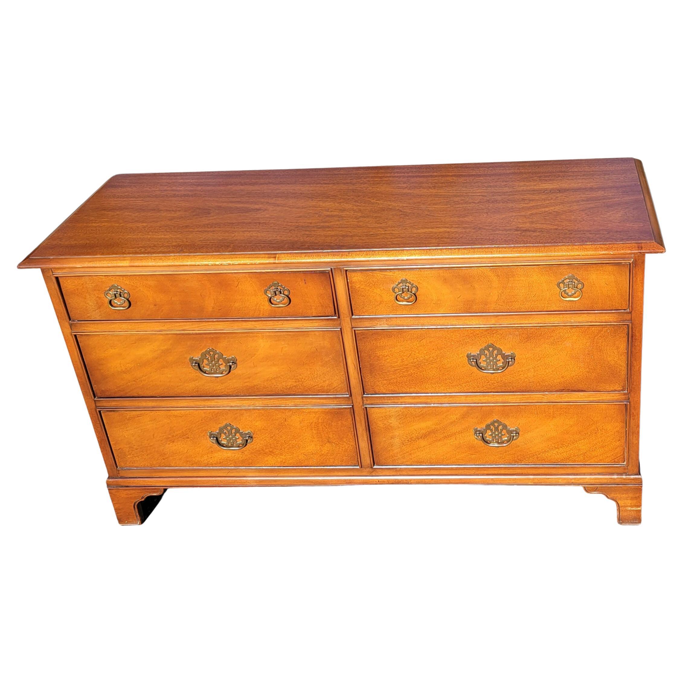 1960s Drexel Solid Genuine Cherry Chippendale double dresser. 6 dovetail joints drawers perfectly functioning, one of which are divided. 
Clean vintage with wear cinsistent with age and use. Measures 56