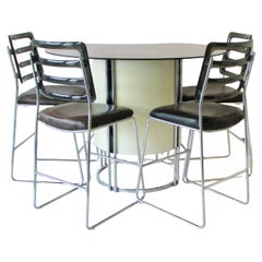 1960s dry bar attributed to Giotto Stoppino with four chrome base bar stools