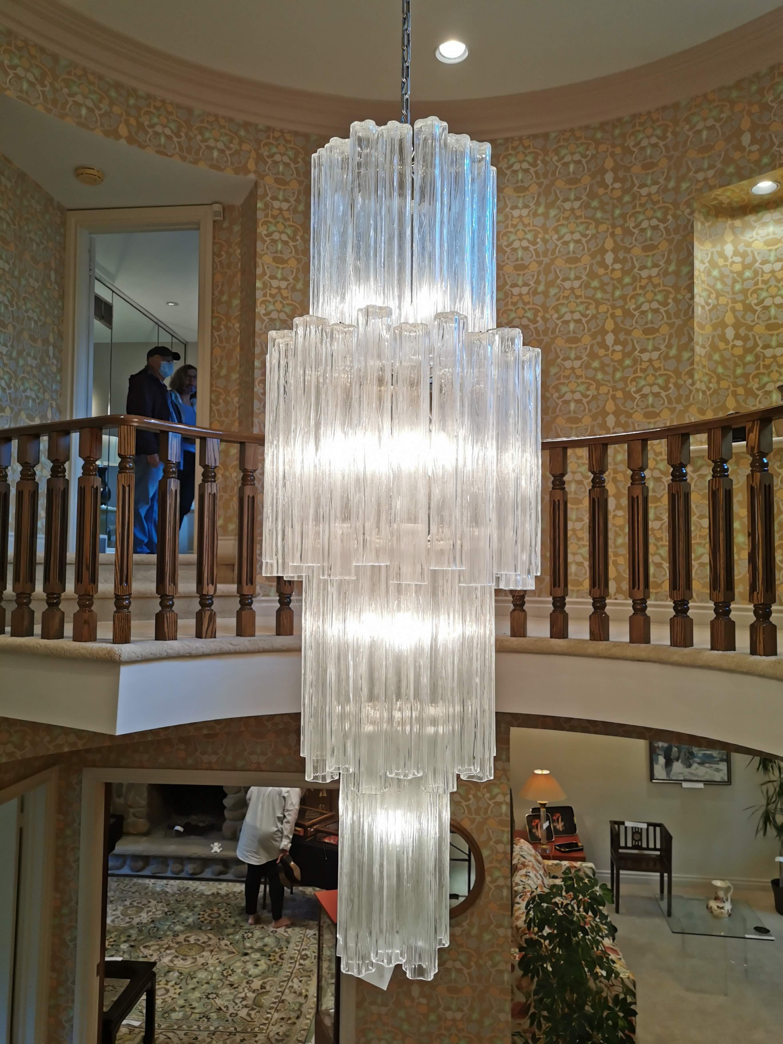 Original Venini ' Tronchi ' huge sculptural chandelier made of thick texturized clear glass pieces .

Each 64  glass shade measure 20 inches in lenght by a 1/4 inches thick . 

Chrome  steel frame .

Measure 72 inches high by 24 inches wide. 

Chain