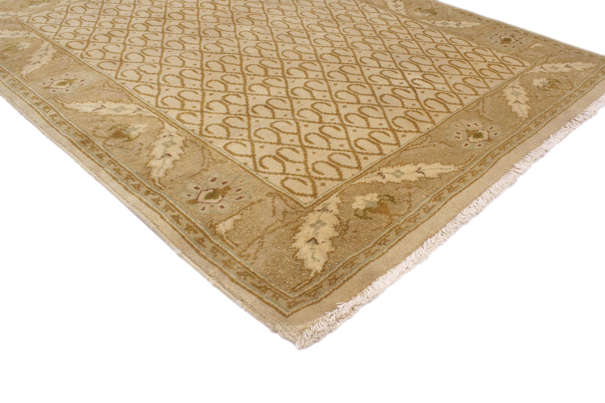 76983 Vintage Earth-Tone Indian Rug, 03'10 x 04'07. Woven with quiet majesty and the grace of centuries-old tradition, this hand-knotted wool vintage Indian rug draws from the poetic heritage of Persian-inspired design while embracing the warm,