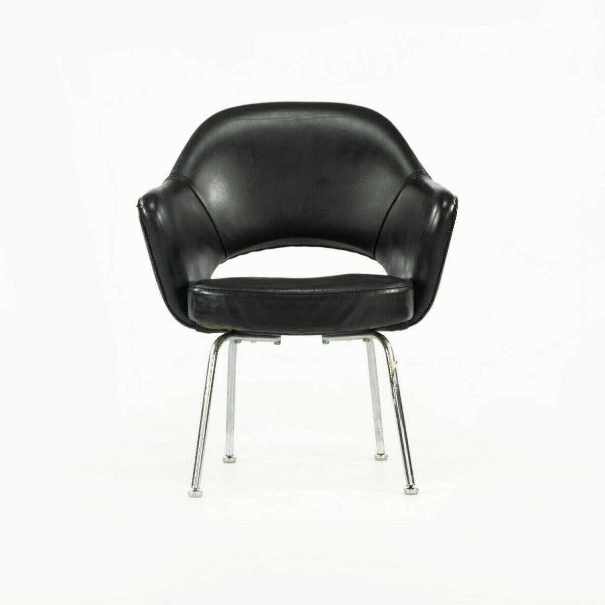 Listed for sale is a 1960s executive armchair No. 71 USB designed by Eero Saarinen and produced by Knoll. This particular example retains part of its original 320 Park Avenue label, dating it to the 1960s. It was specified in black leather, which is