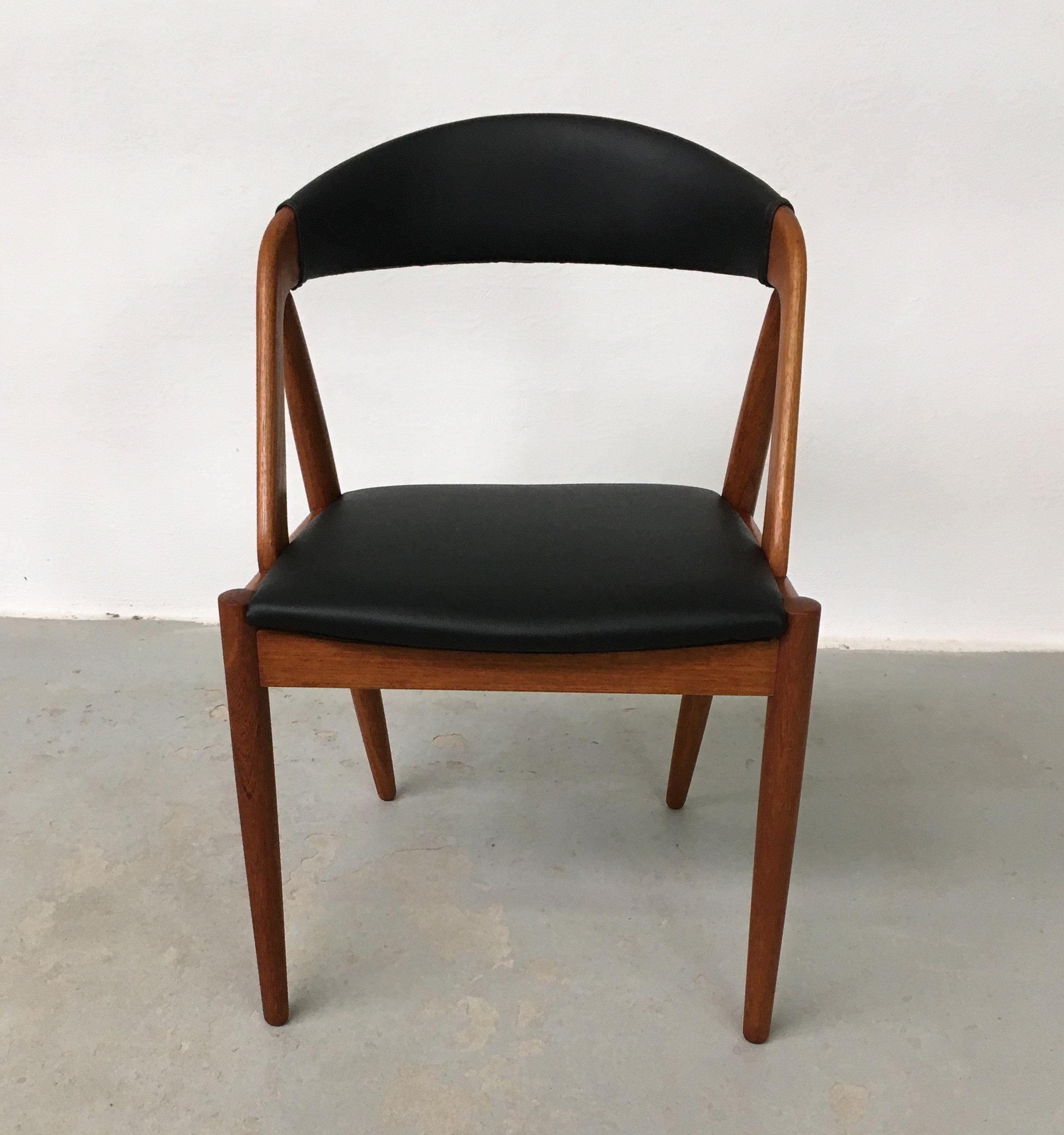 Kai Kristiansen set of eight fully restored teak dining chairs by Schou Andersens Møbel Fabrik including custom upholstery.

The A-frame model 31 dining chairs were designed by Kai Kristiansen in 1956 for Schou-Andersens Møbelfabrik and the A-frame