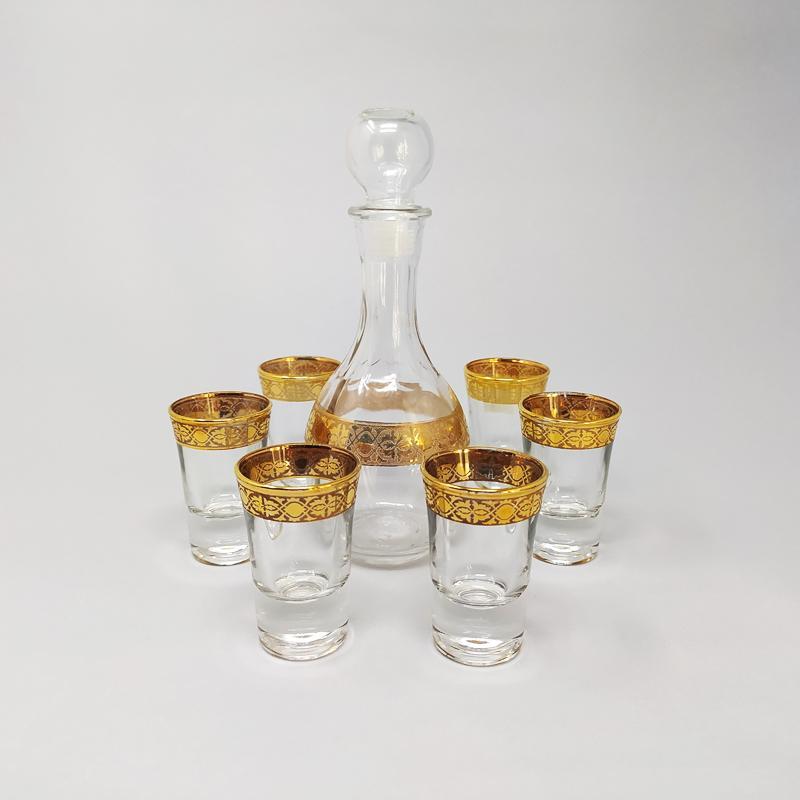 Gorgeous  Decanter with 6 glasses 1960s Made in Italy
_ Decanter
_ 6 Glasses

Dimensions:
Decanter
3,14