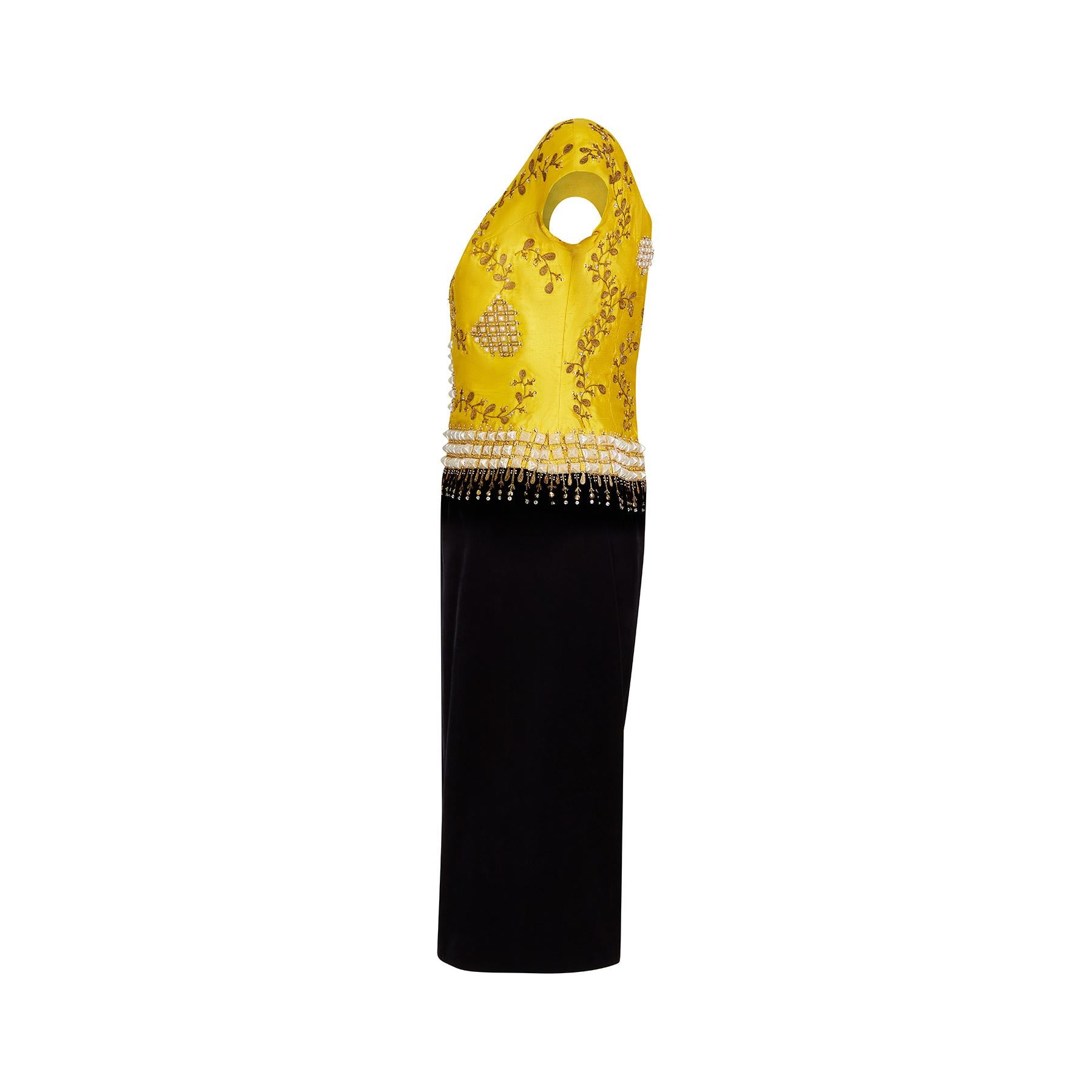 1960s Eliane Montigny of Paris black velvet and yellow raw silk cocktail dress.  This is a really striking evening dress of extraordinary workmanship and made to the highest haute couture standards.  It has an elaborate embroidered arrangement on