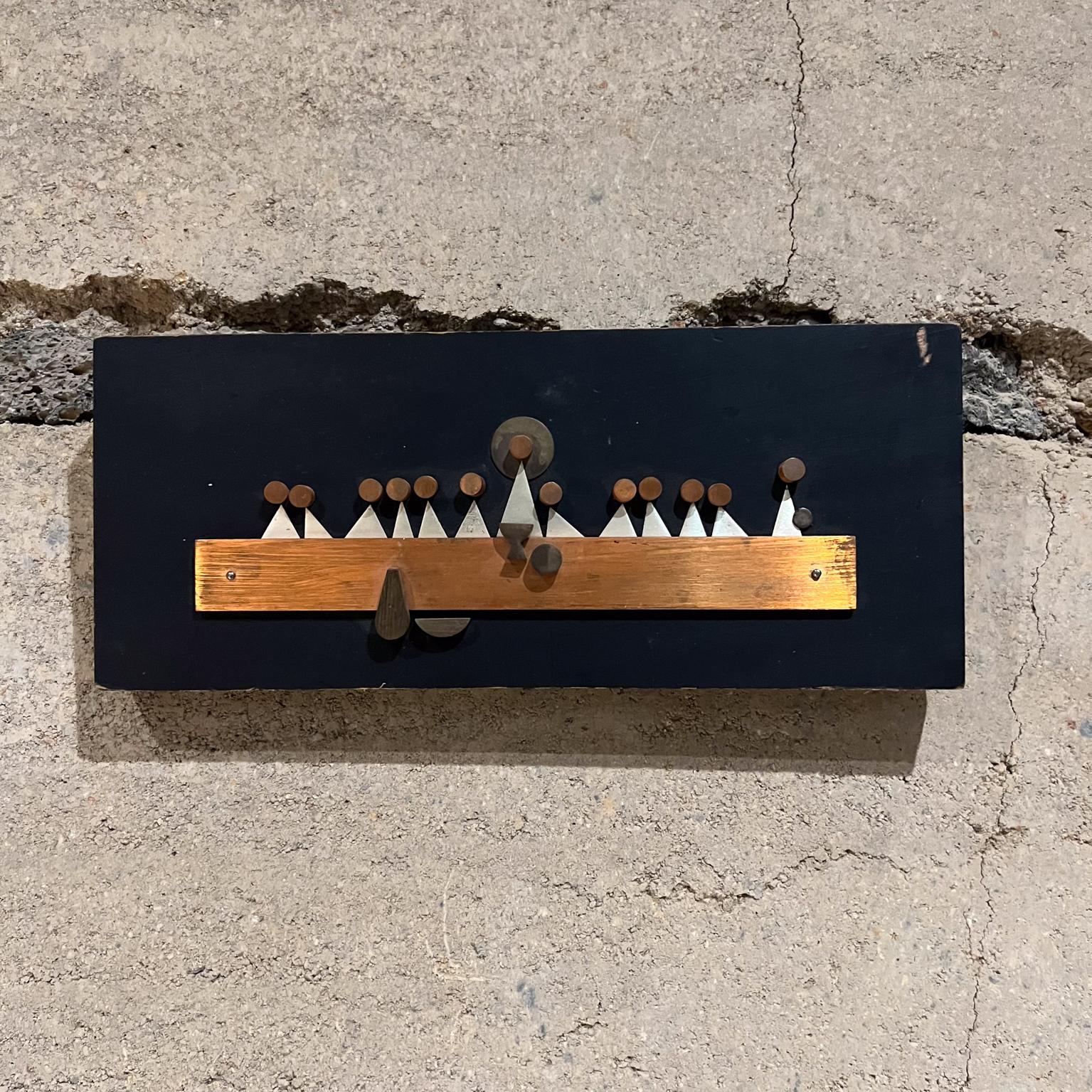 
1960s Last Supper Abstract Wall Sculpture Modernist Plaque
by Emaus Benedictine Monks of Cuernavaca, Mexico
Maker stamp
Solid Wood Mixed Metals
5 h x 12 w x 1 d
Original vintage unrestored preowned condition.
Please refer to images.