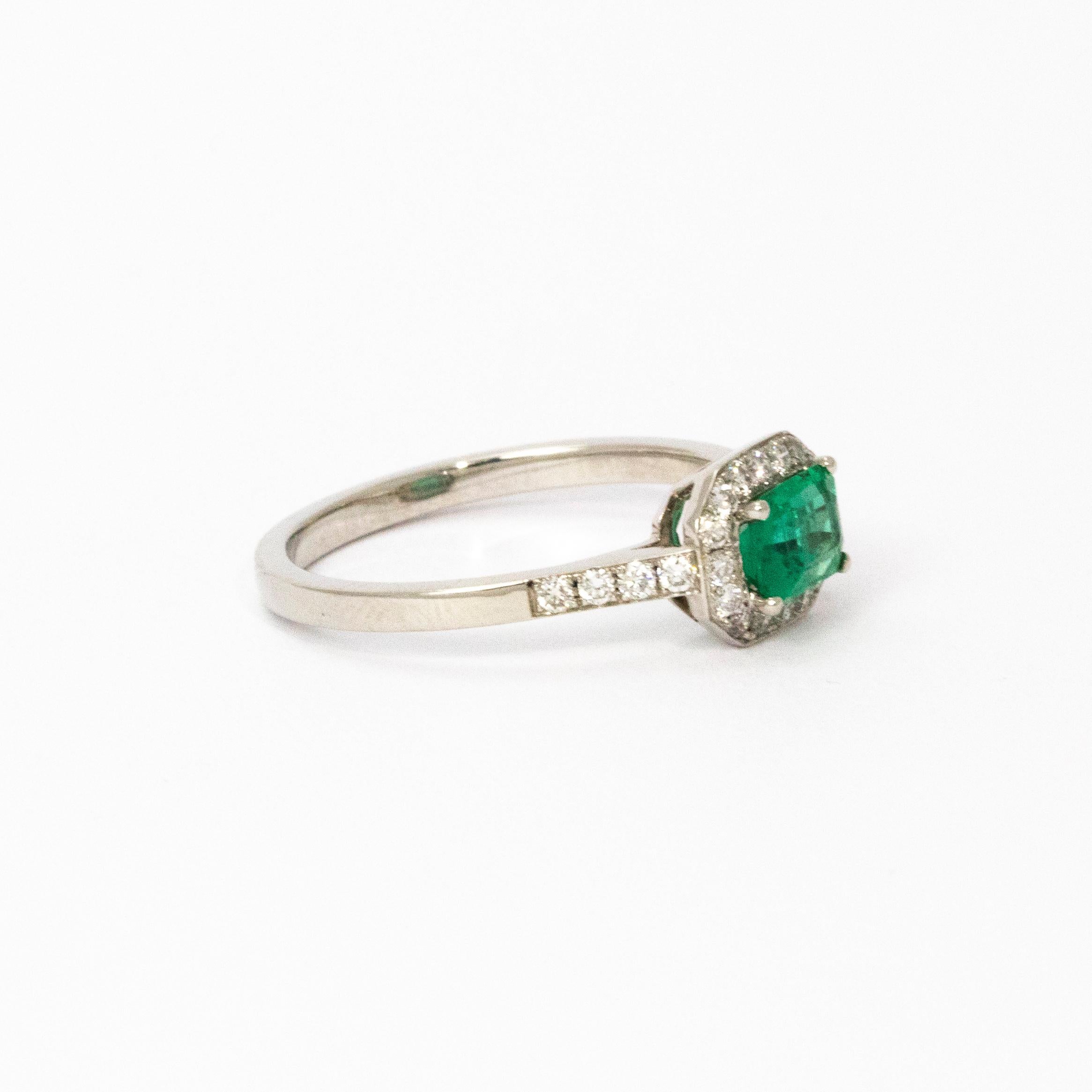 1960s Emerald Diamond Halo Platinum Ring 1