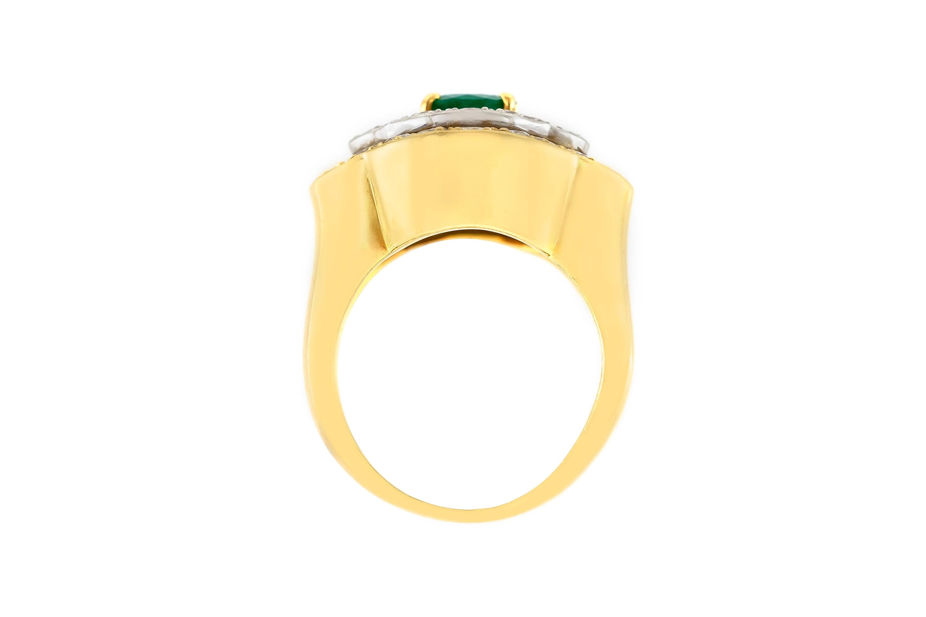 The ring is finely crafted in 18k yellow gold wuth center stone emerald weighing approximately total of 0.60 carat and diamonds weighing approximately total of 2.00carat.

Circa 1960.