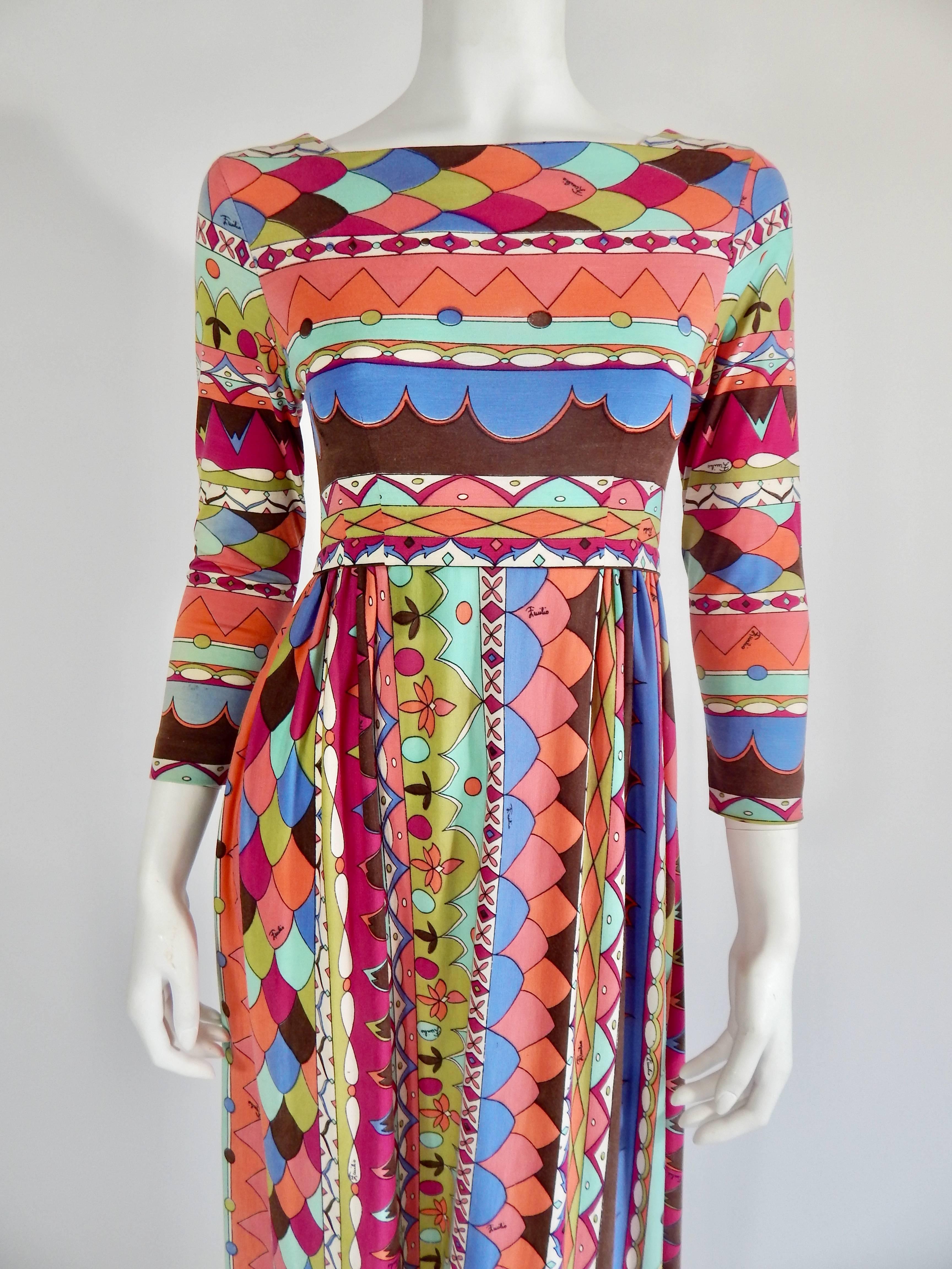 Fabulous 1960s Emilio Pucci Maxi Dress from Saks Fifth Ave. Original Tag reads size 12. However it is more like an approximate modern day size 4 - 6. Excellent Condition with exception of minor wear to fabric on close inspection.
US Domestic