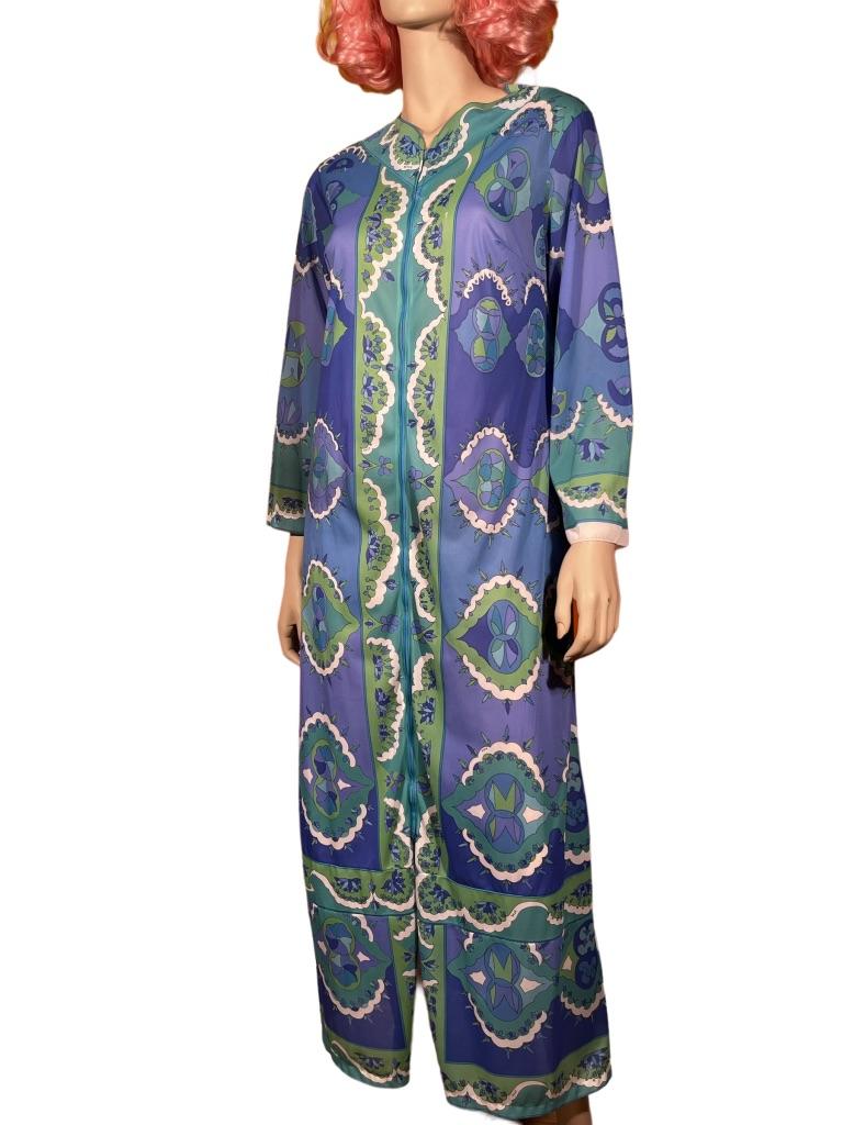 Classic 60’s Pucci Print zip-up dress or cover-up. Gorgeous blue/green patterned sheer lightweight nylon fabric with EPFR (Emilio Pucci for Form Fit Rogers) signature. Zips up the front, but does not completely open – the zipper stops 15” from the