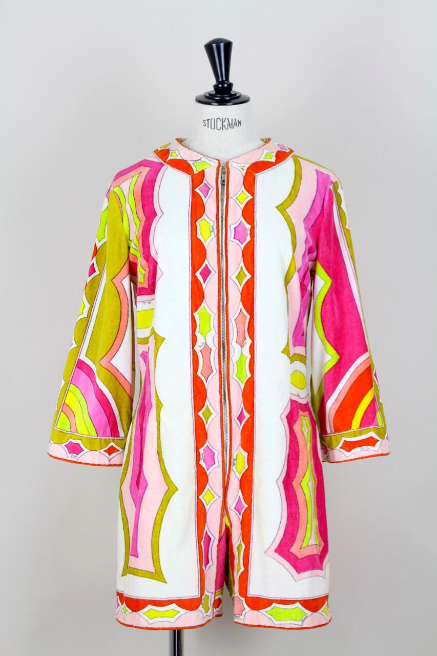 Pucci terry cloth pieces were designed for the beach and reflect the jet set life style that Emilio Pucci and his clients often lived within the 1960s and 1970s. This fabulous vibrant coloured playsuit and matching handbag set is particularly rare.
