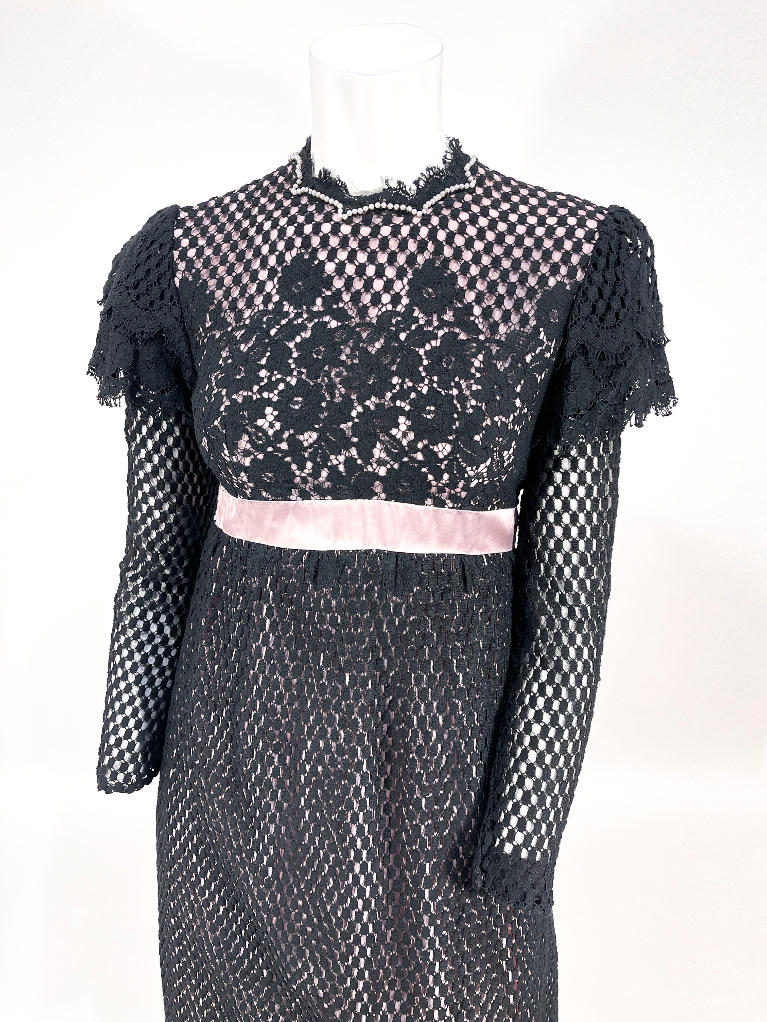 1960s Emma Domb Over dyed lace dress. The entire dress is featuring a black dyed lace. The full length sleeves are sheer lined with a sheer net and has a decorative lace cap sleeves on the top of the shoulder. The bodice and skirt of the dress are