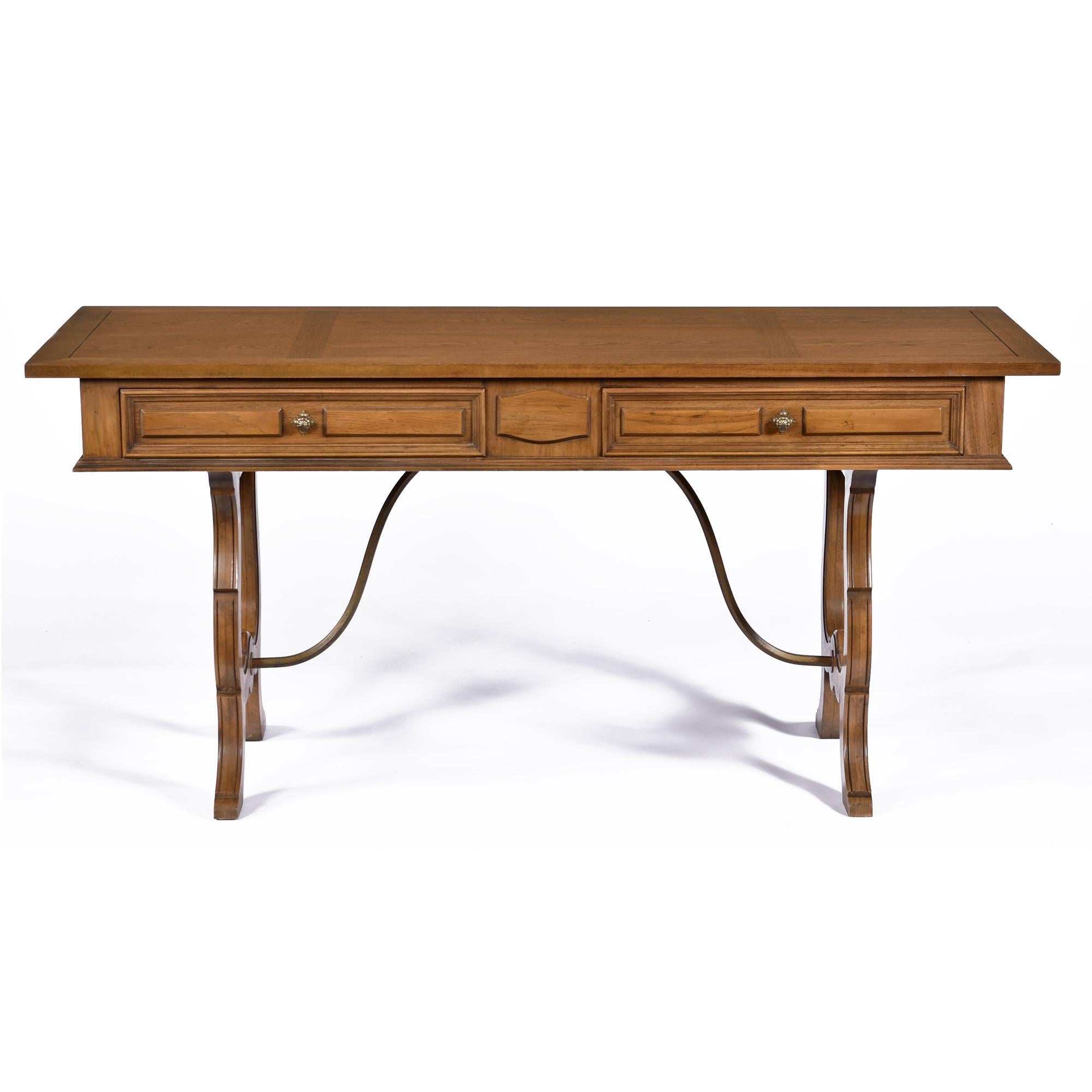 This English Regency style pecan writing desk by Thomasville would be perfect in any room.  Desk, console, or entryway table to name a few.  The stain / tone appears to be in the family of 