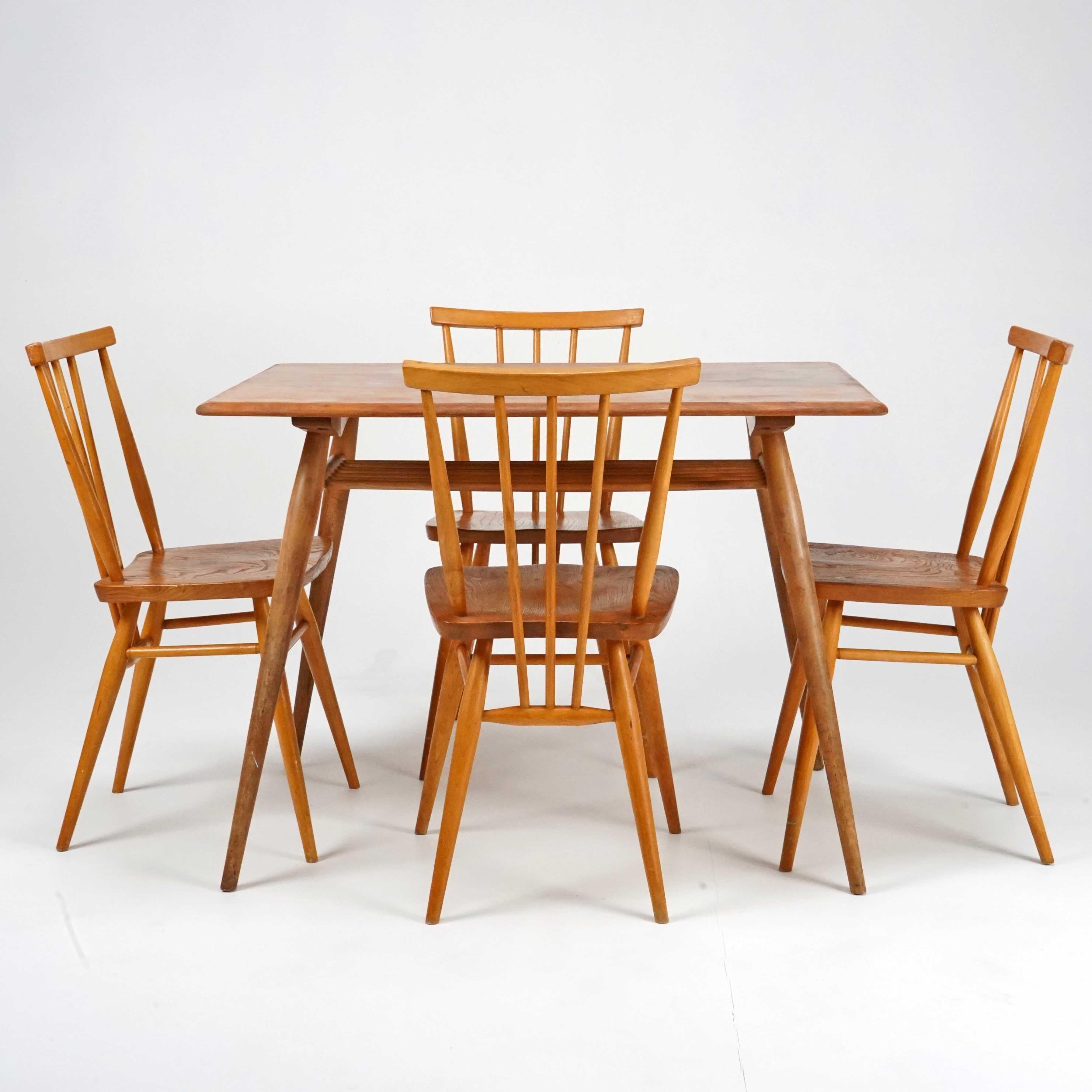 A Ercol breakfast table & chair set which comes with 4 all purpose stick back chairs and are all made from blonde British Elm. 
Please do take a careful look at all our pictures and note that these are antique or vintage pieces that will show sign