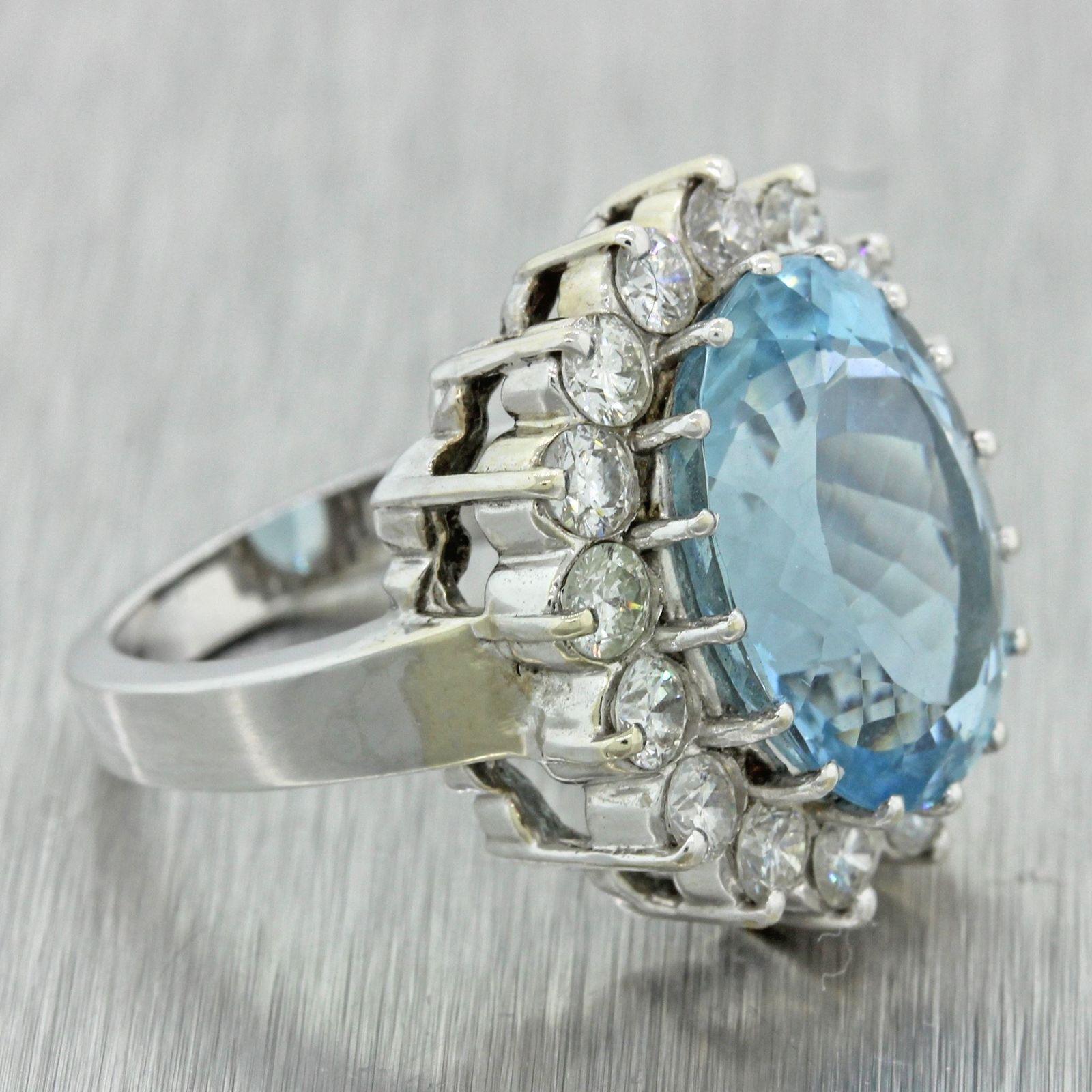 A gorgeous iconic 14k gold aquamarine stone surrounded in a beautiful halo of 1.60 carats of VS white diamonds.  The aquamarine has been officially graded by GIA; one of worlds most reputable diamond grading organizations.

The center aquamarine