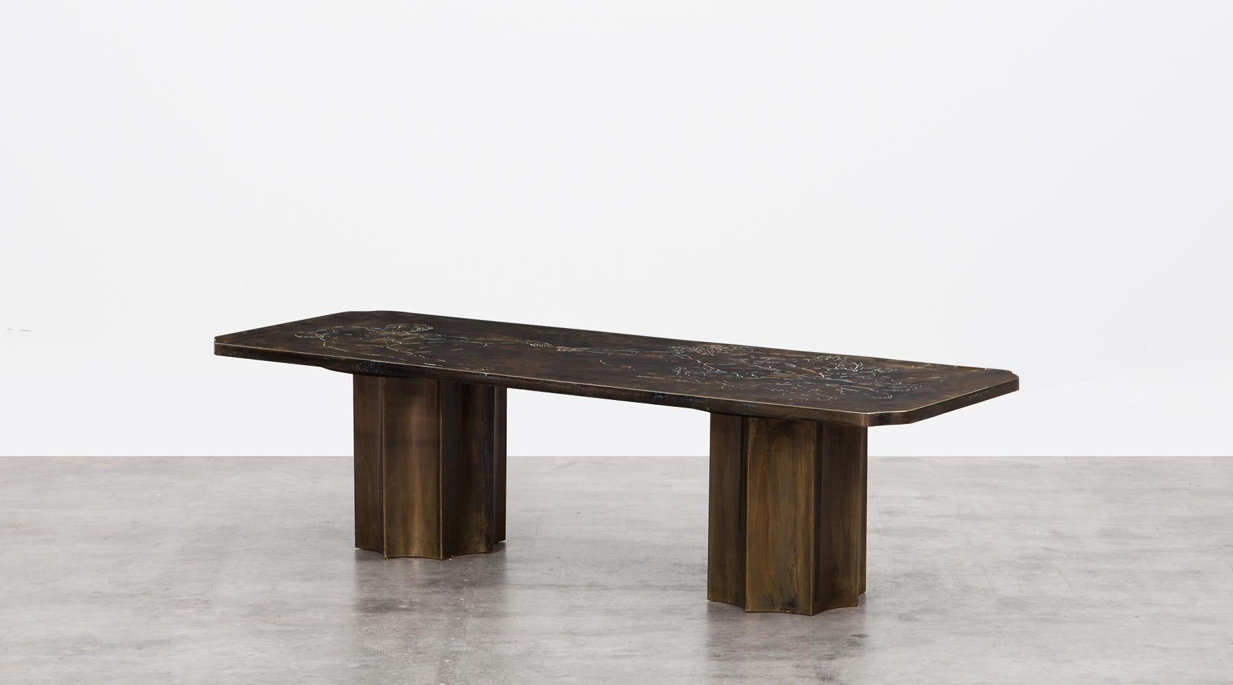 Very rare and unique coffee table designed by Philip and Kelvin LaVerne. The bronze table stands on two arched pedestals, the beautiful patterned etched surface shows the motifs of the famous Italian painter Michelangelo - the creation of Adam. The